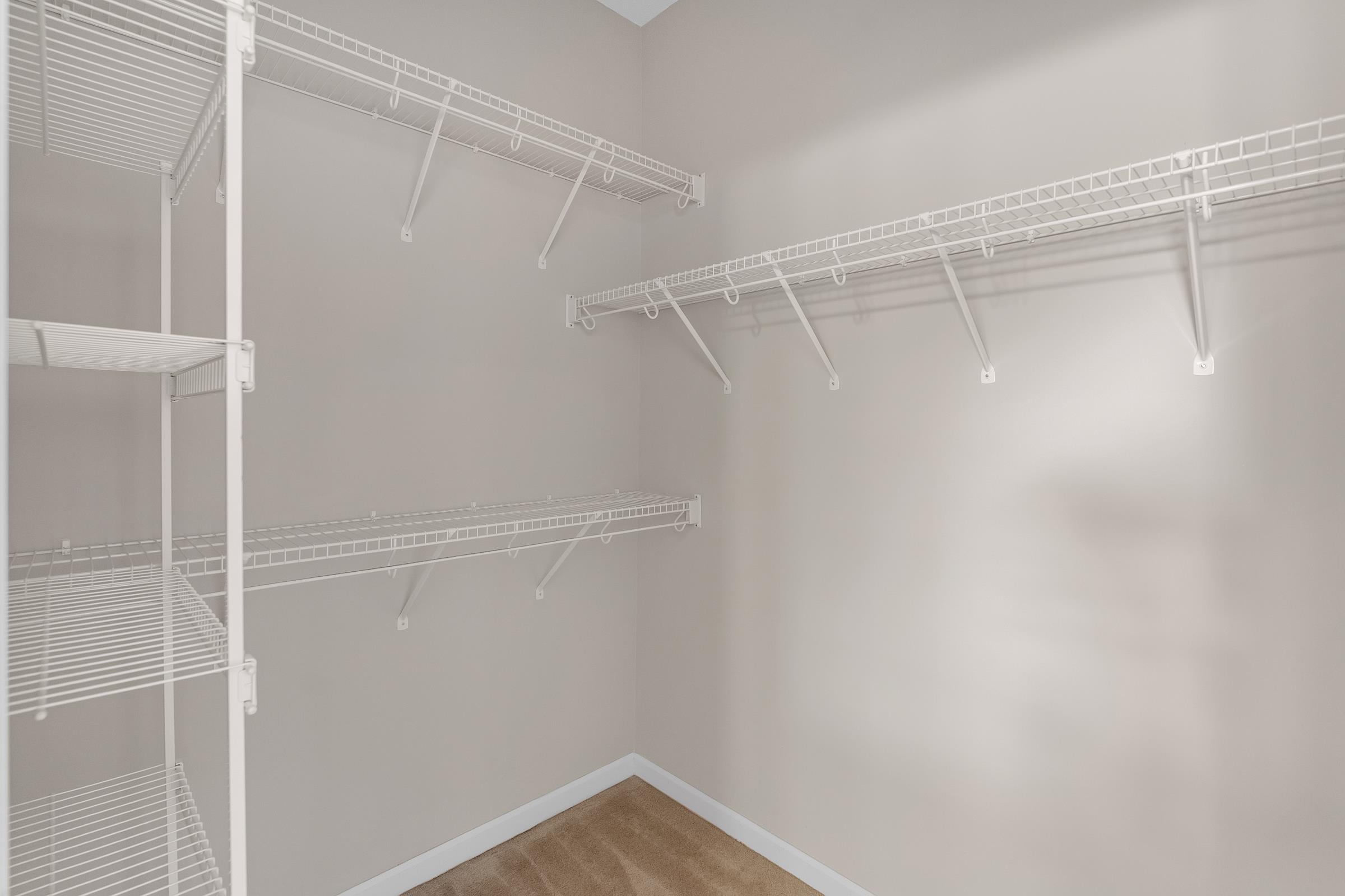 1229 North Sanga Road Memphis, TN 38016 - Photo 14 of 32 Spacious closet featuring light carpet