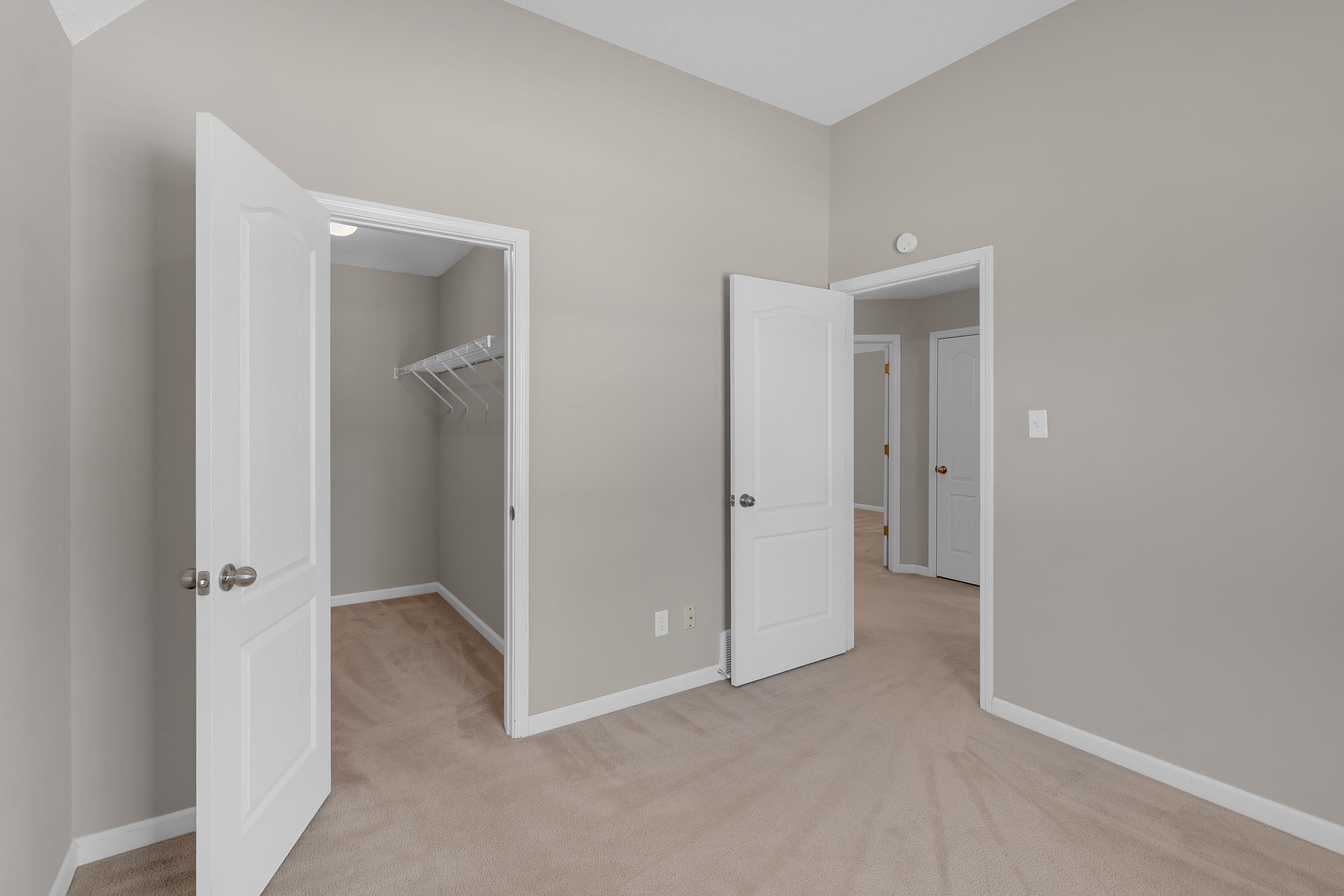 1229 North Sanga Road Memphis, TN 38016 - Photo 18 of 32 Unfurnished bedroom with a spacious closet and light colored carpet