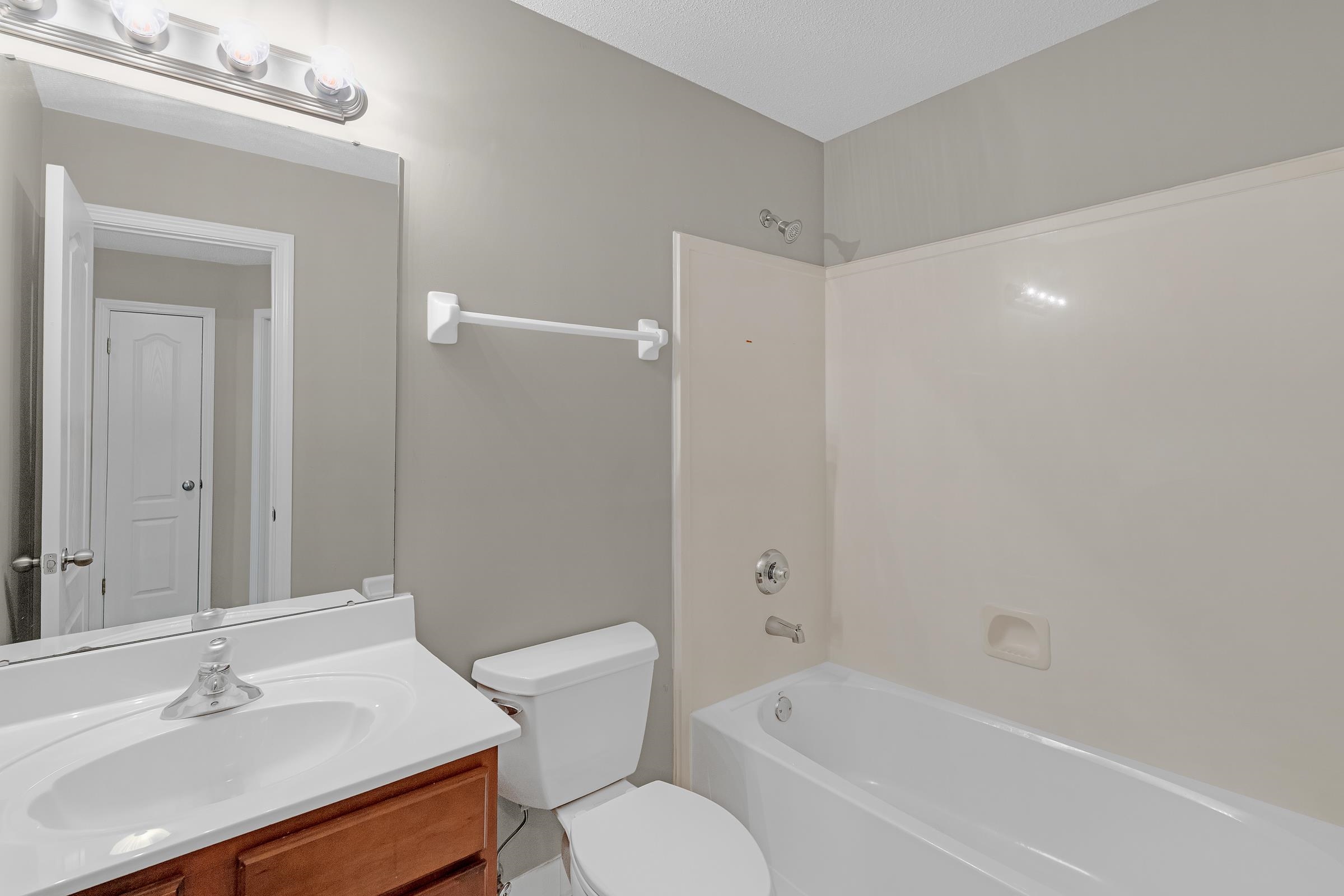 1229 North Sanga Road Memphis, TN 38016 - Photo 20 of 32 Full bath featuring bathing tub / shower combination and vanity