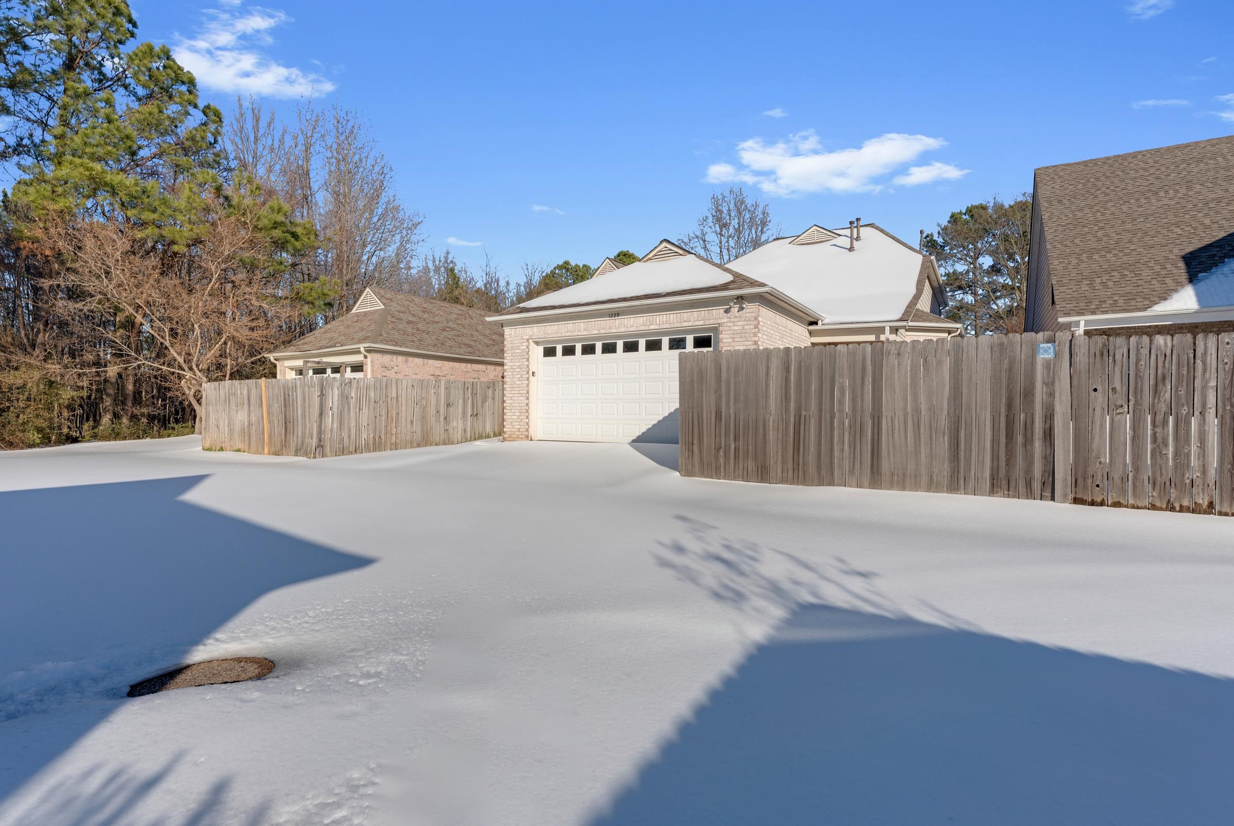 1229 North Sanga Road Memphis, TN 38016 - Photo 30 of 32 View of property exterior with brick siding