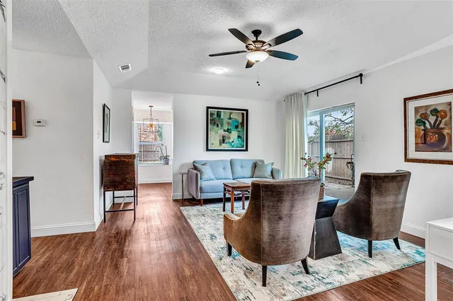 a view of a park with swings and slides