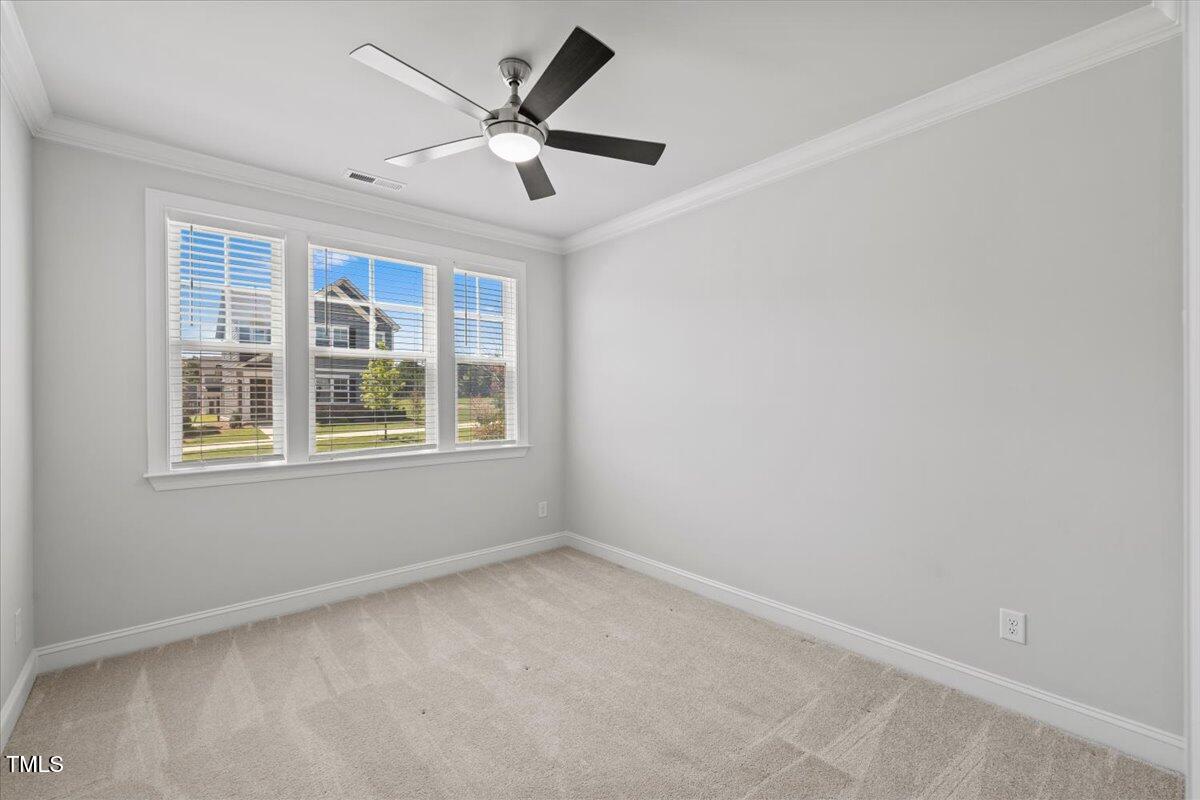 4716 Crescent Square Street, Unit 1314 Raleigh, NC 27616 - Photo 15 of 61 First floor Guest Bedroom