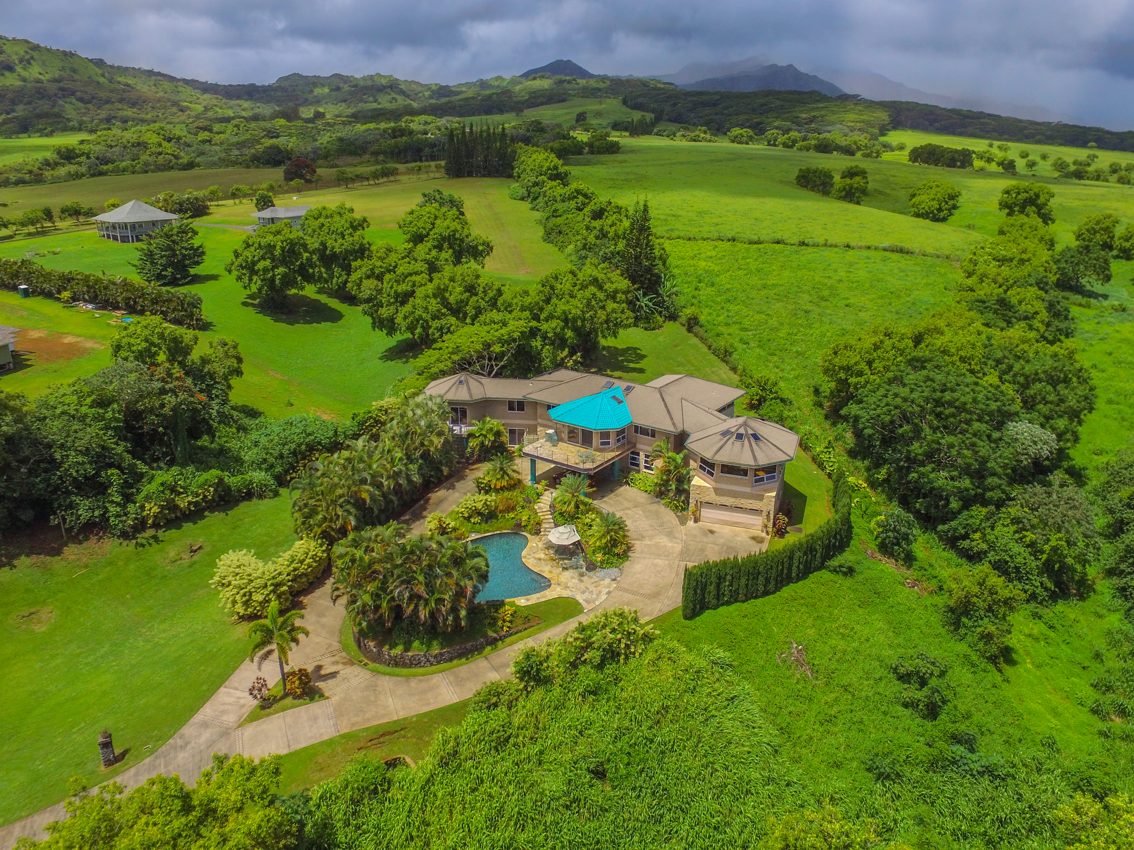 4700 Kapuna Road Kilauea, HI 96754 - Photo 16 of 17 a view of a lake with a houses