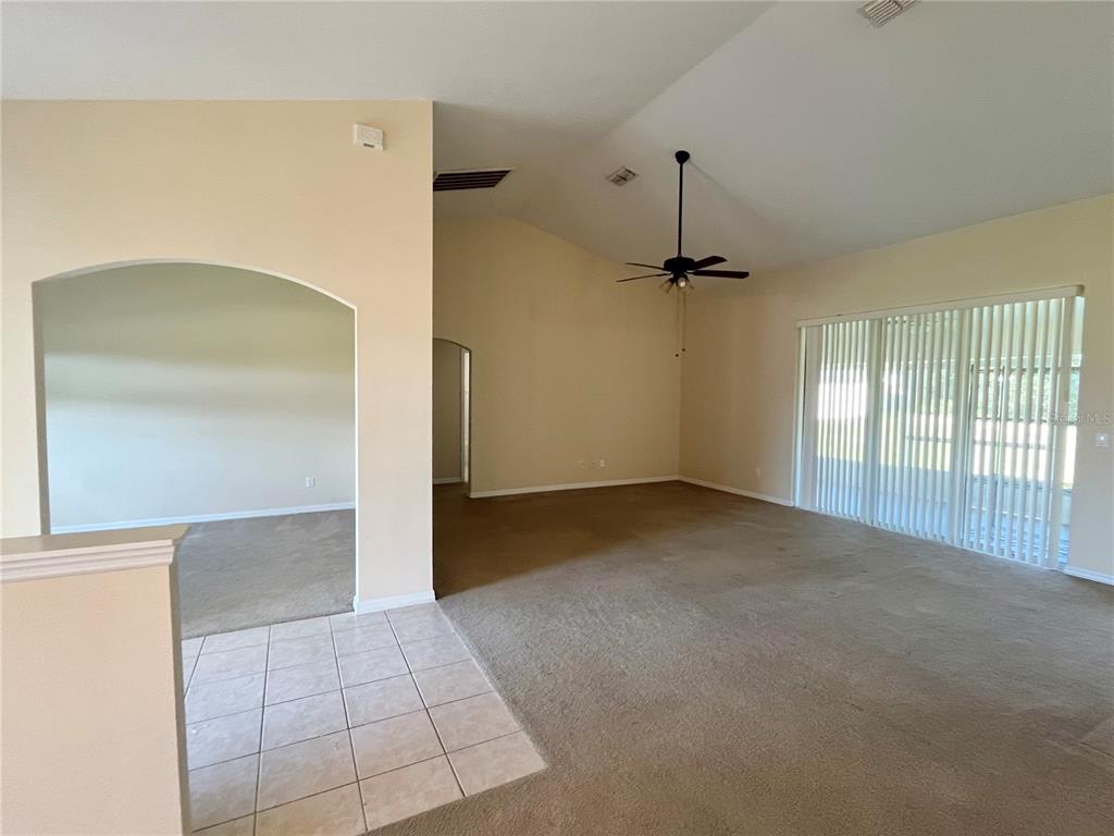 4420 Southwest 100th Street Ocala, FL 34476 - Photo 11 of 22 a view of a room with a staircase