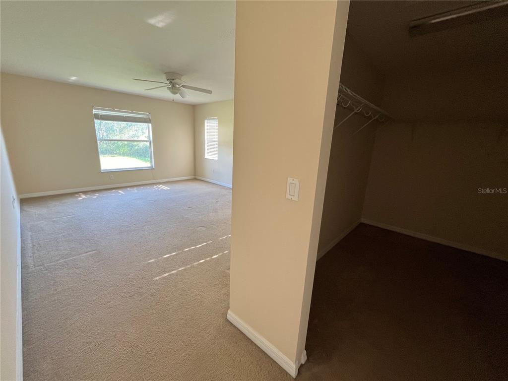 4420 Southwest 100th Street Ocala, FL 34476 - Photo 15 of 22 an empty room with windows