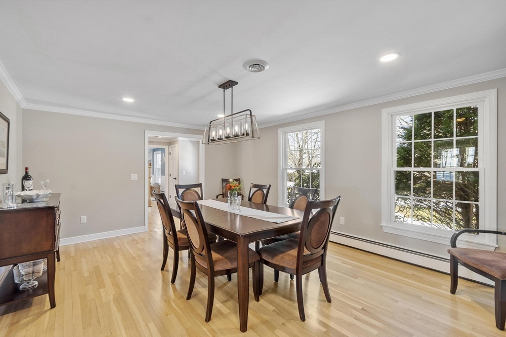 2 Greybirch Road Andover, MA 01810 - Photo 14 of 41 a view of a dining room with furniture window and wooden floor
