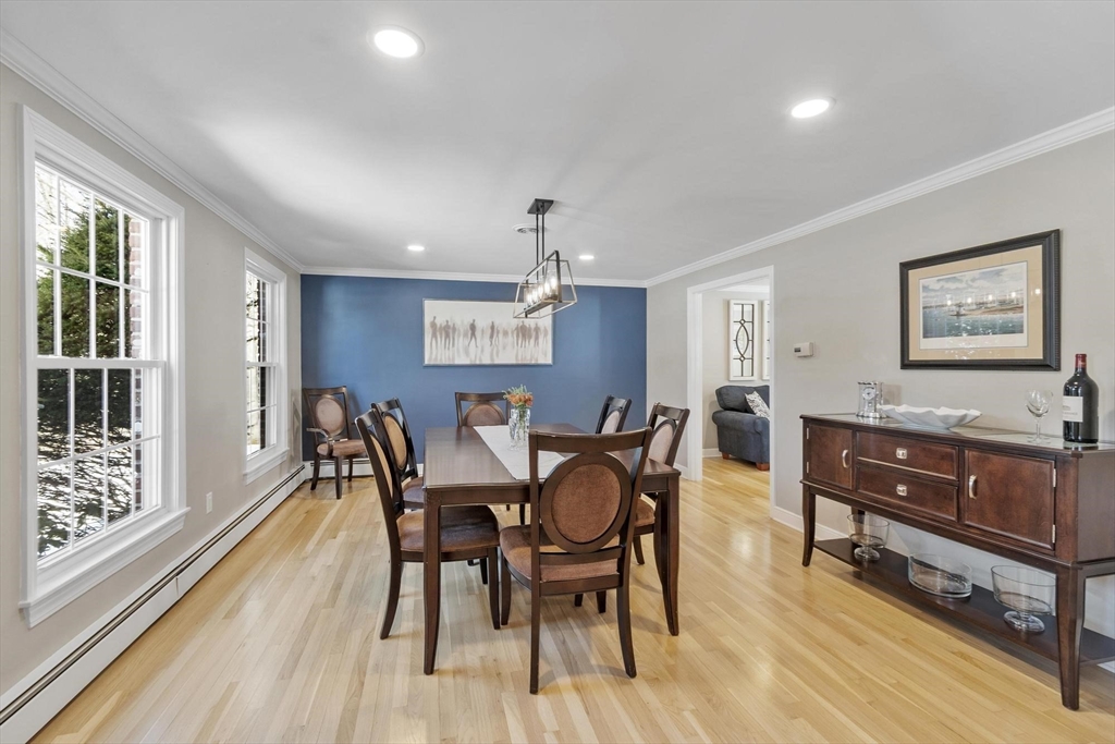 2 Greybirch Road Andover, MA 01810 - Photo 15 of 41 a view of a dining room with furniture and wooden floor