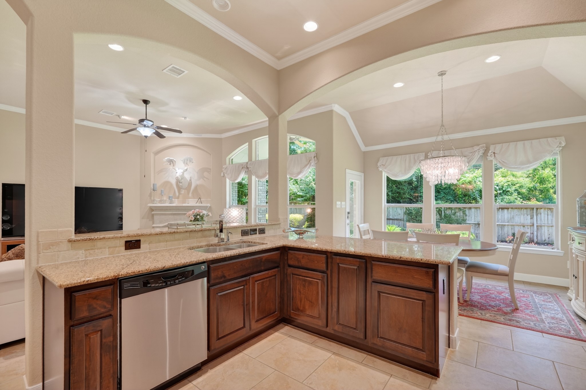 55 South Victoriana Circle Spring, TX 77389 - Photo 17 of 40 a kitchen with a sink stove and cabinets
