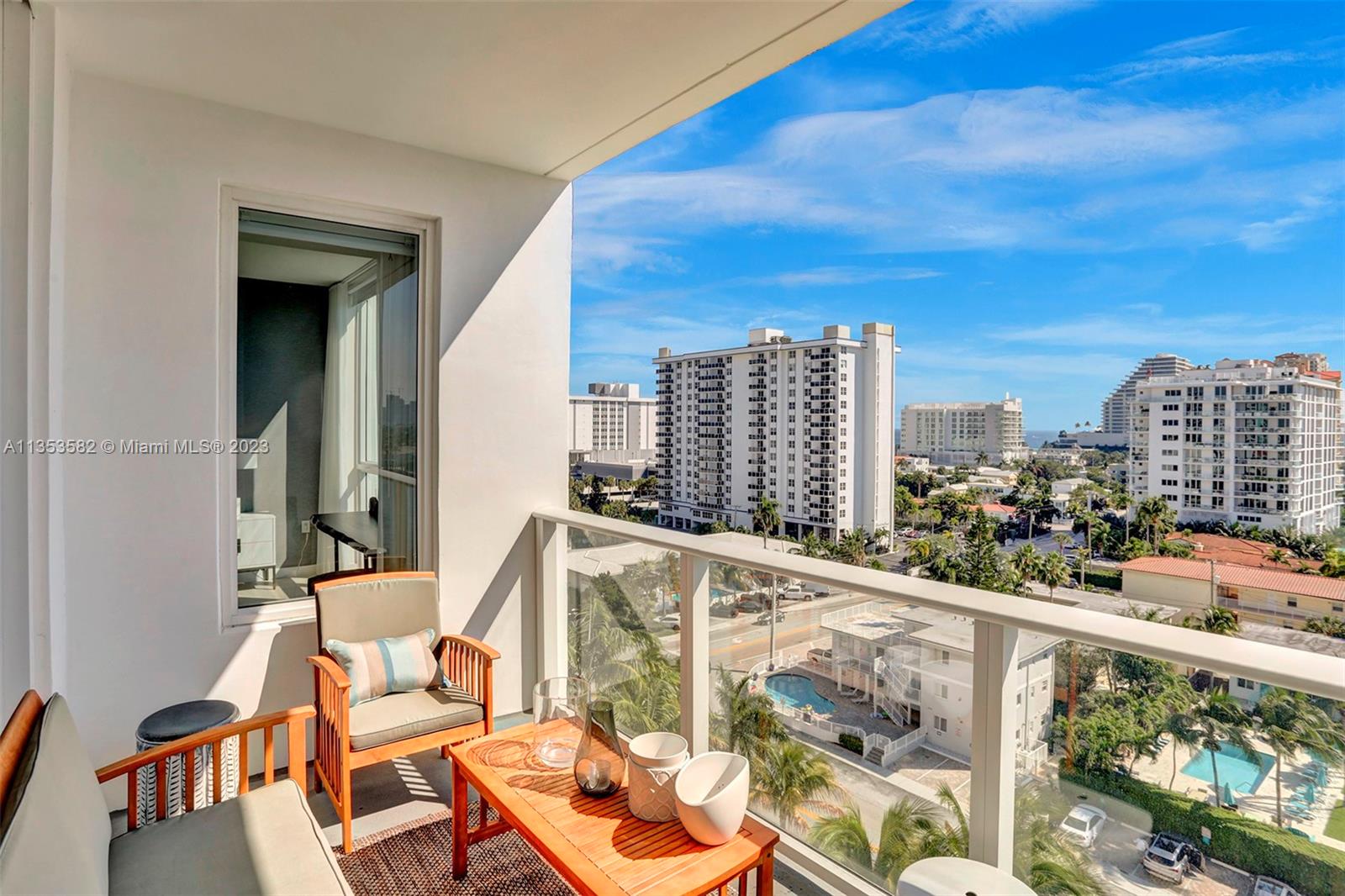 401 North Birch Road, Unit 903 Fort Lauderdale, FL 33304 - Photo 17 of 42 a view of balcony with two chairs and a table