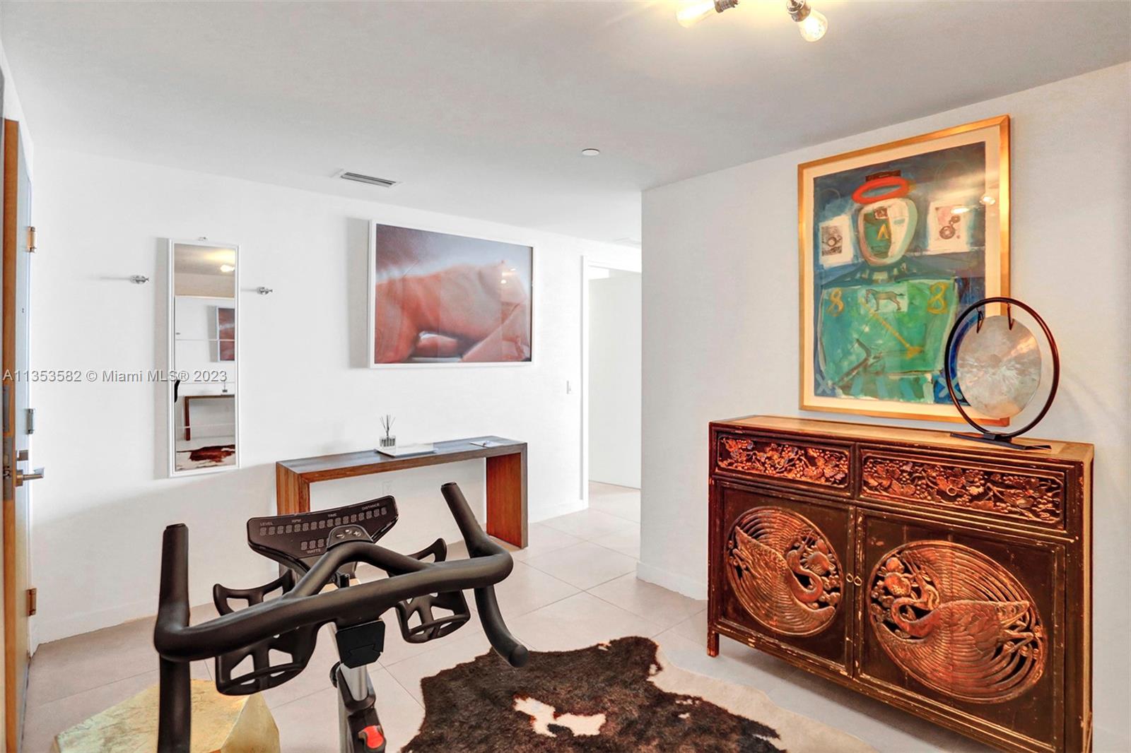 401 North Birch Road, Unit 903 Fort Lauderdale, FL 33304 - Photo 31 of 42 a living room with furniture a fireplace and a window