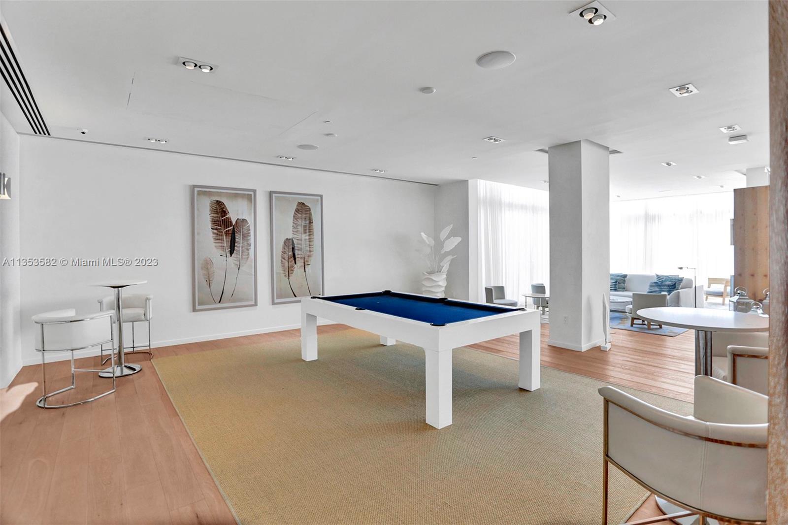 401 North Birch Road, Unit 903 Fort Lauderdale, FL 33304 - Photo 32 of 42 a living room with pool table and chairs