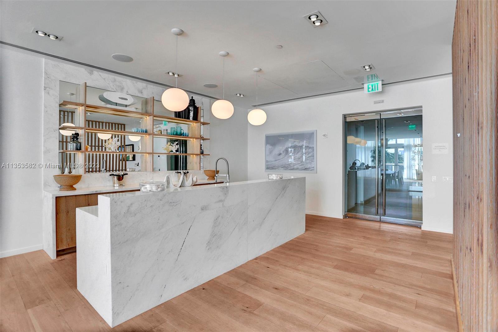 401 North Birch Road, Unit 903 Fort Lauderdale, FL 33304 - Photo 33 of 42 a view of a kitchen and an entryway