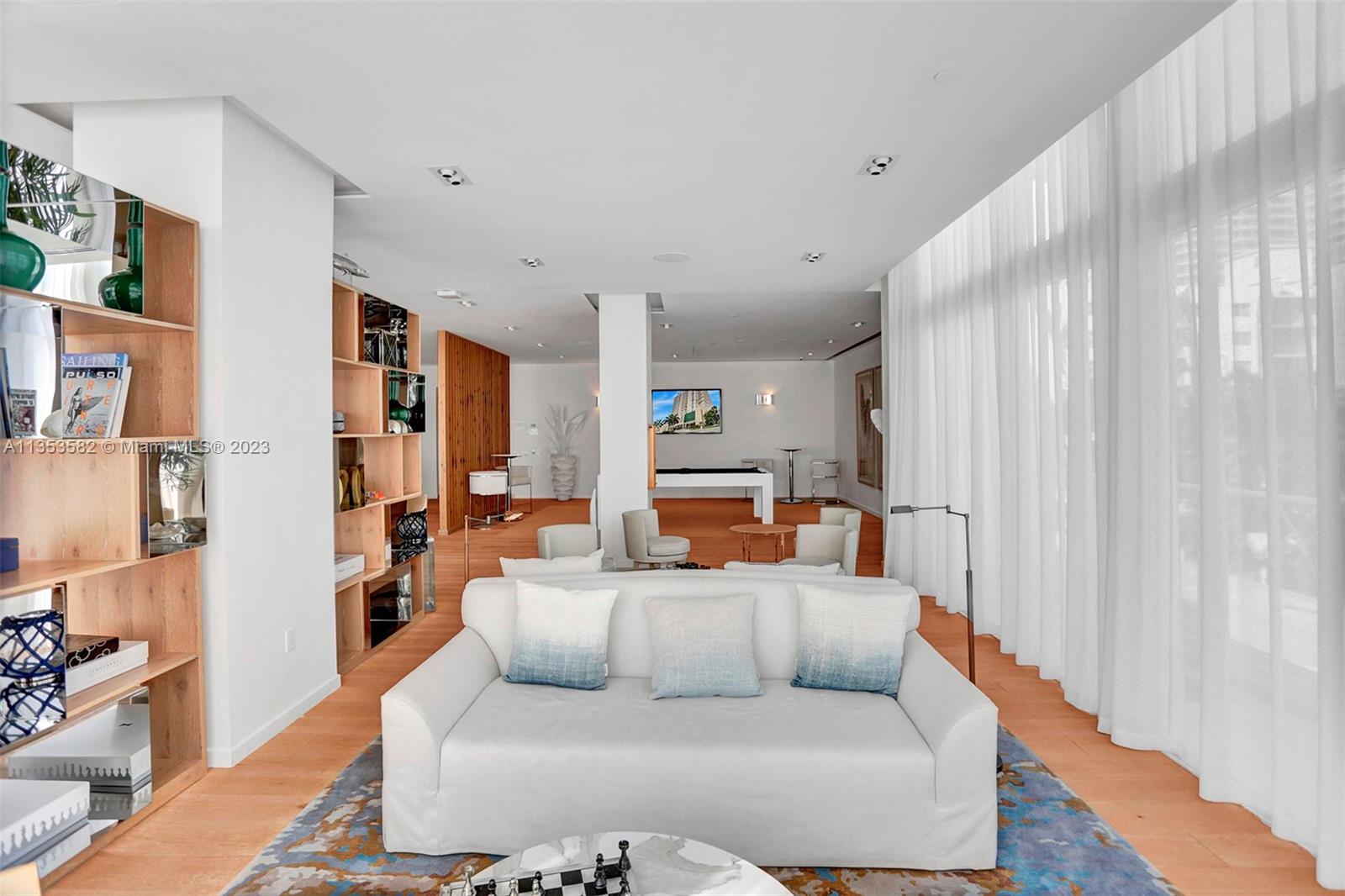 401 North Birch Road, Unit 903 Fort Lauderdale, FL 33304 - Photo 35 of 42 a living room with furniture and a large window