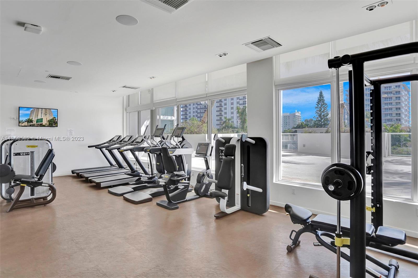 401 North Birch Road, Unit 903 Fort Lauderdale, FL 33304 - Photo 37 of 42 a view of a room with gym equipment