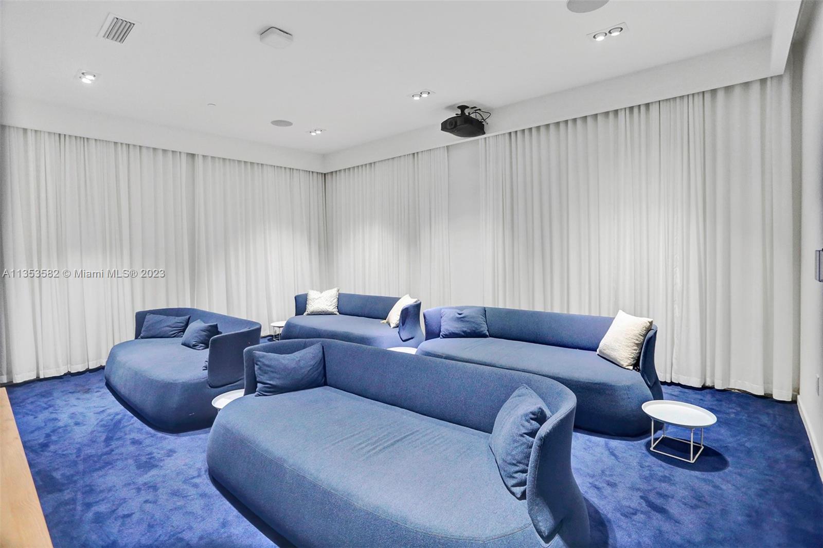 401 North Birch Road, Unit 903 Fort Lauderdale, FL 33304 - Photo 40 of 42 a living room with furniture and wooden floor