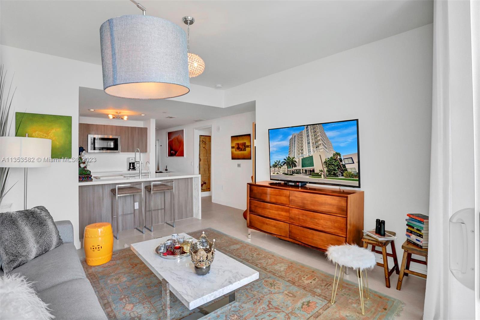 401 North Birch Road, Unit 903 Fort Lauderdale, FL 33304 - Photo 9 of 42 a living room with furniture and a wooden floor