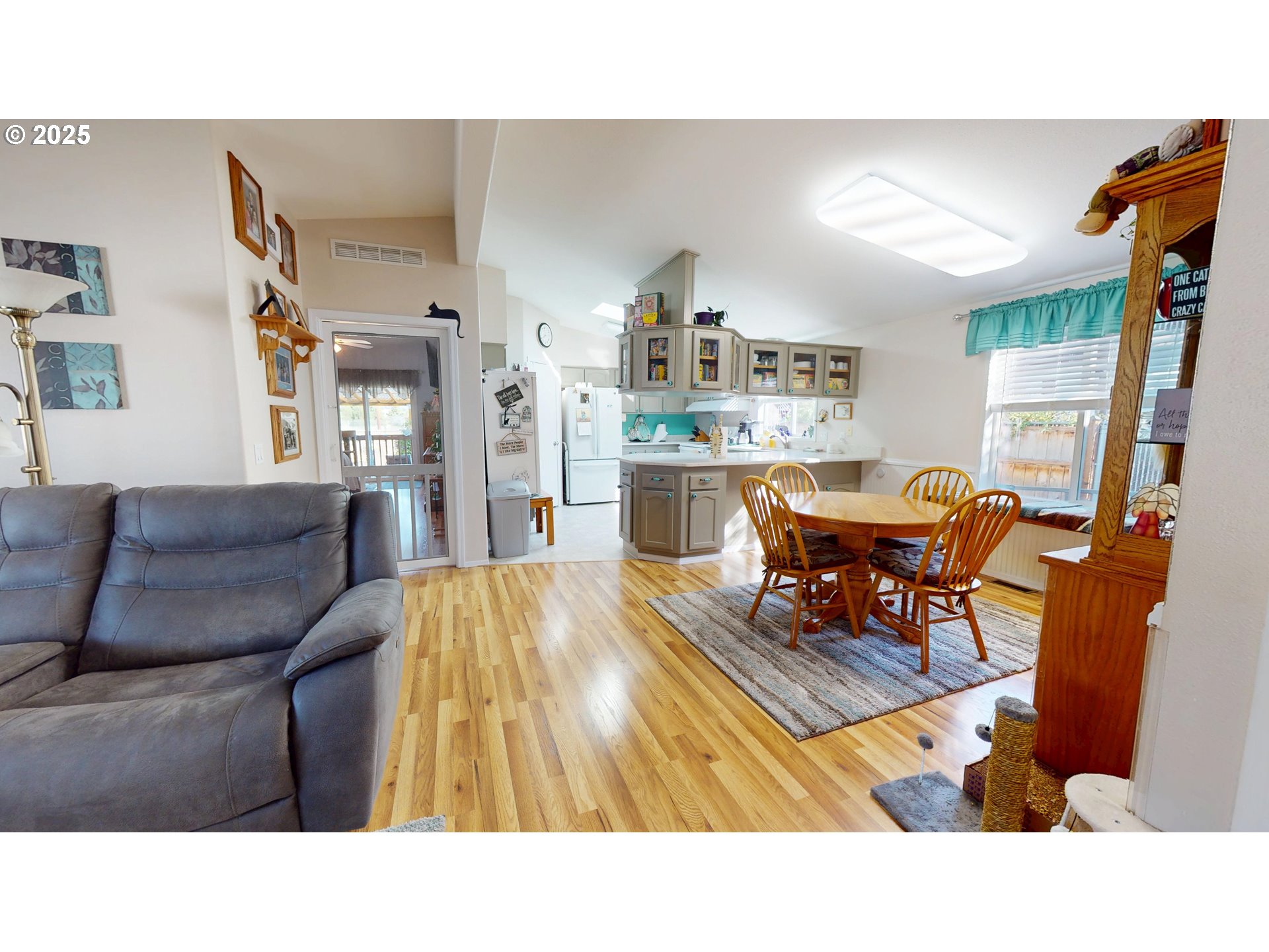 2753 Maia Loop Springfield, OR 97477 - Photo 11 of 40 a living room with furniture and a dining table