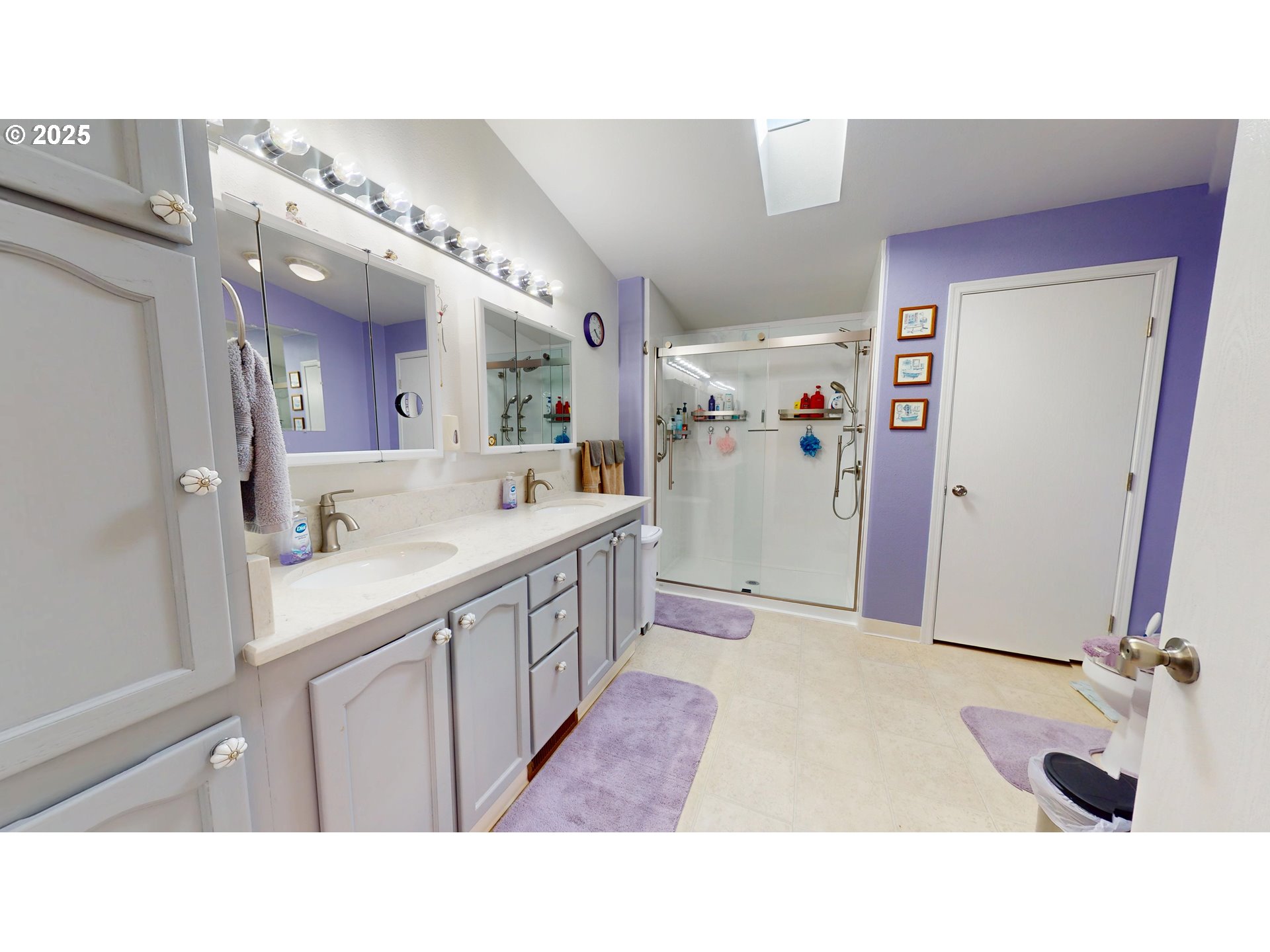 2753 Maia Loop Springfield, OR 97477 - Photo 24 of 40 a bathroom with a sink a mirror and a toilet