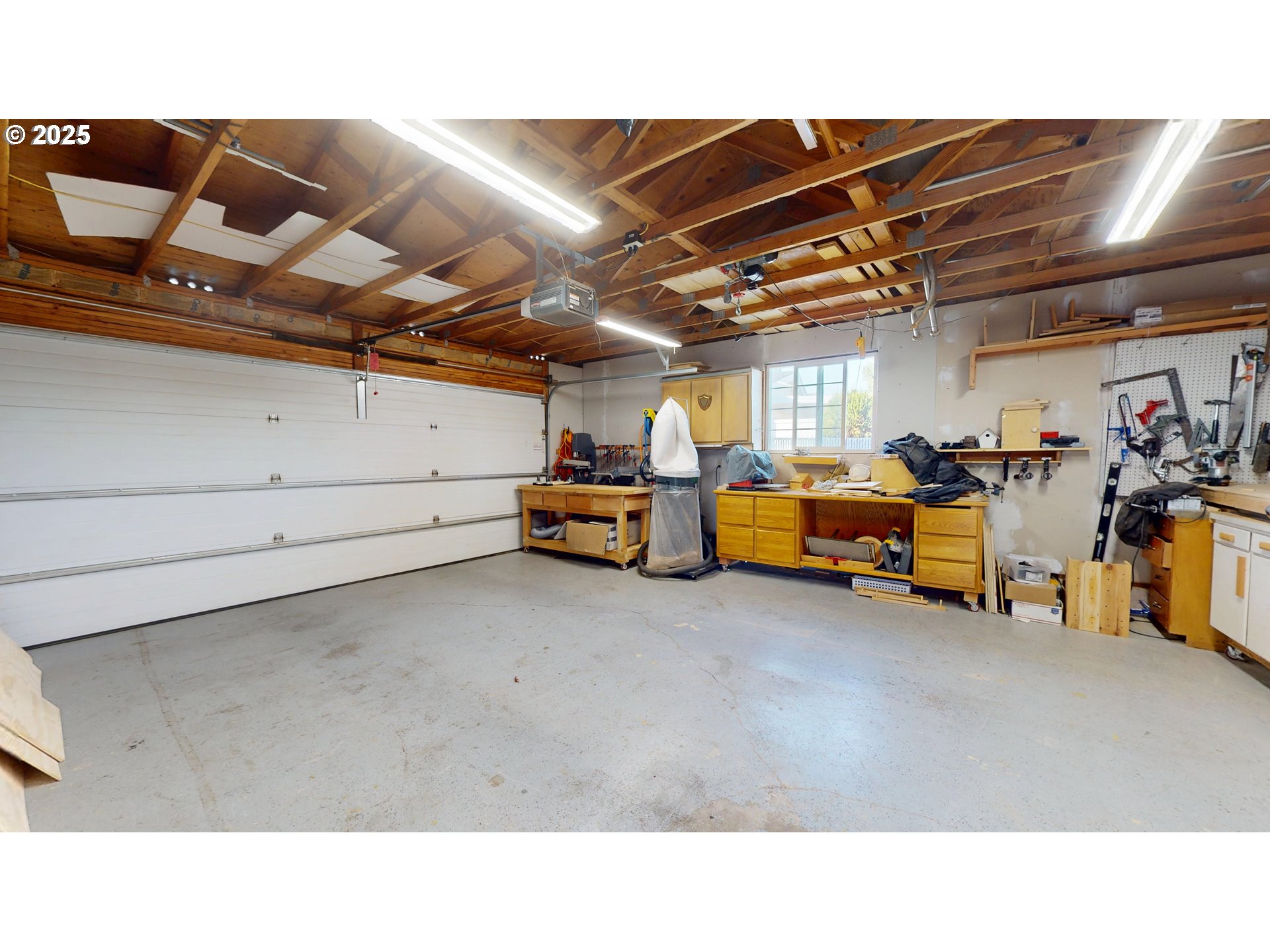 2753 Maia Loop Springfield, OR 97477 - Photo 33 of 40 a living room with lots of furniture and a flat screen tv