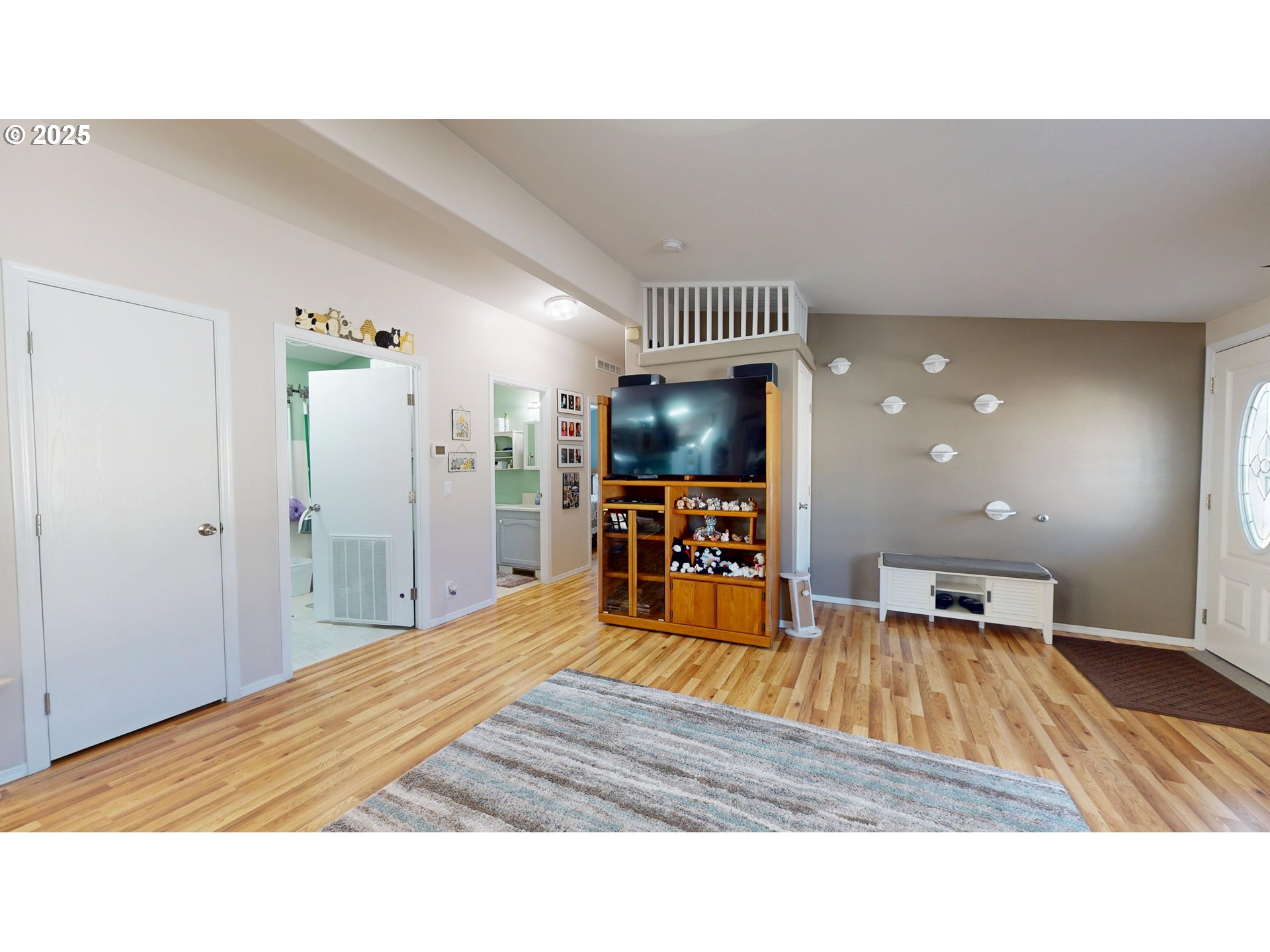 2753 Maia Loop Springfield, OR 97477 - Photo 39 of 40 a living room with furniture and a flat screen tv