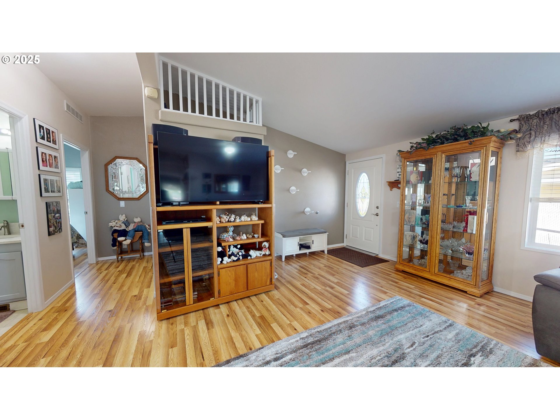 2753 Maia Loop Springfield, OR 97477 - Photo 40 of 40 a living room with furniture and a flat screen tv