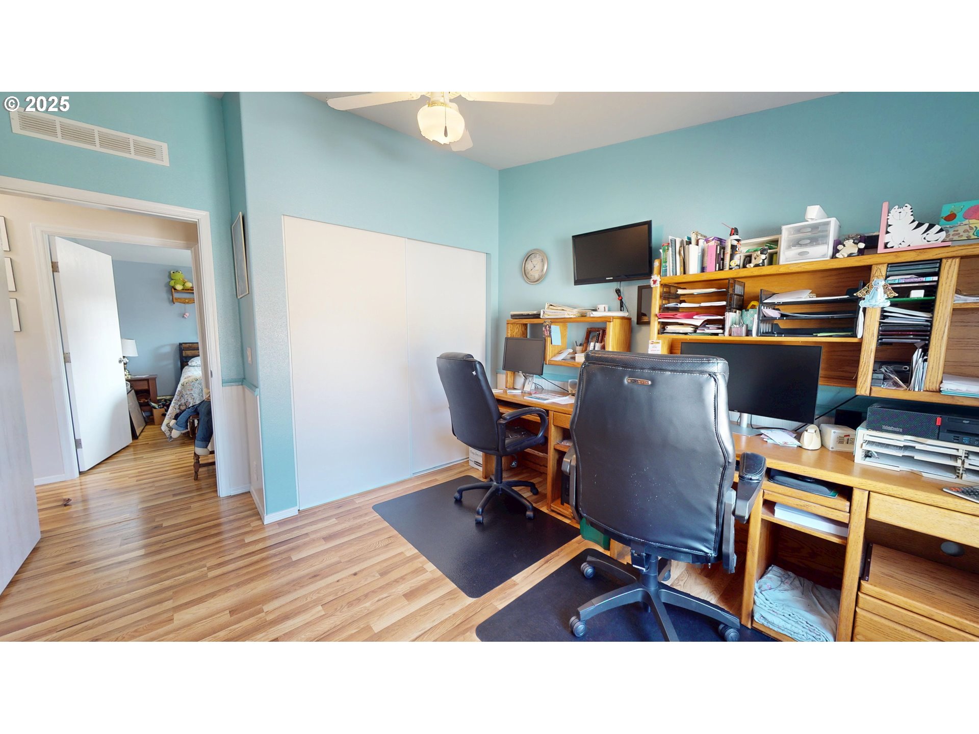 2753 Maia Loop Springfield, OR 97477 - Photo 8 of 40 a room with furniture and a flat screen tv