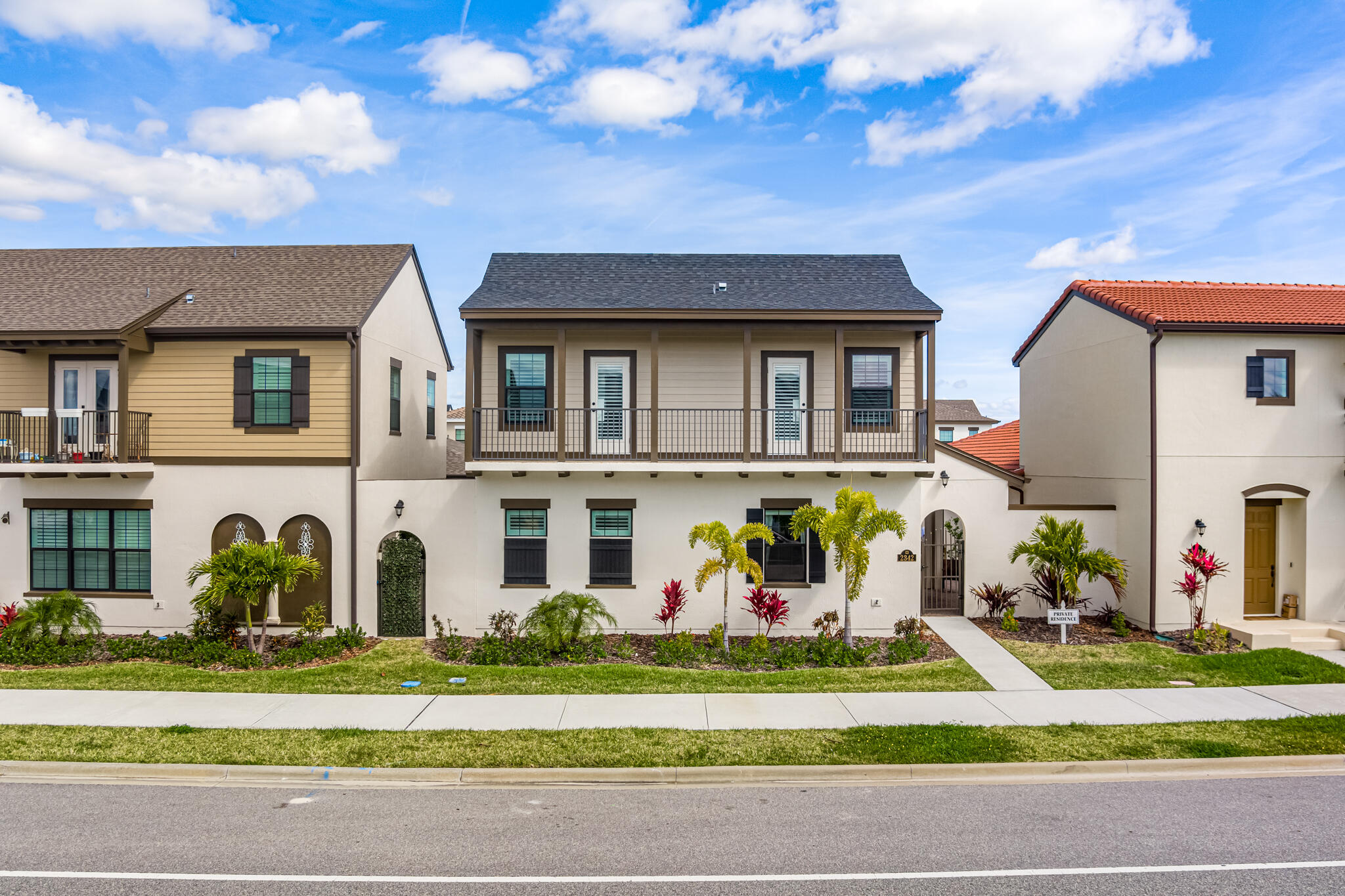 a front view of house with a garden and entertaining space
