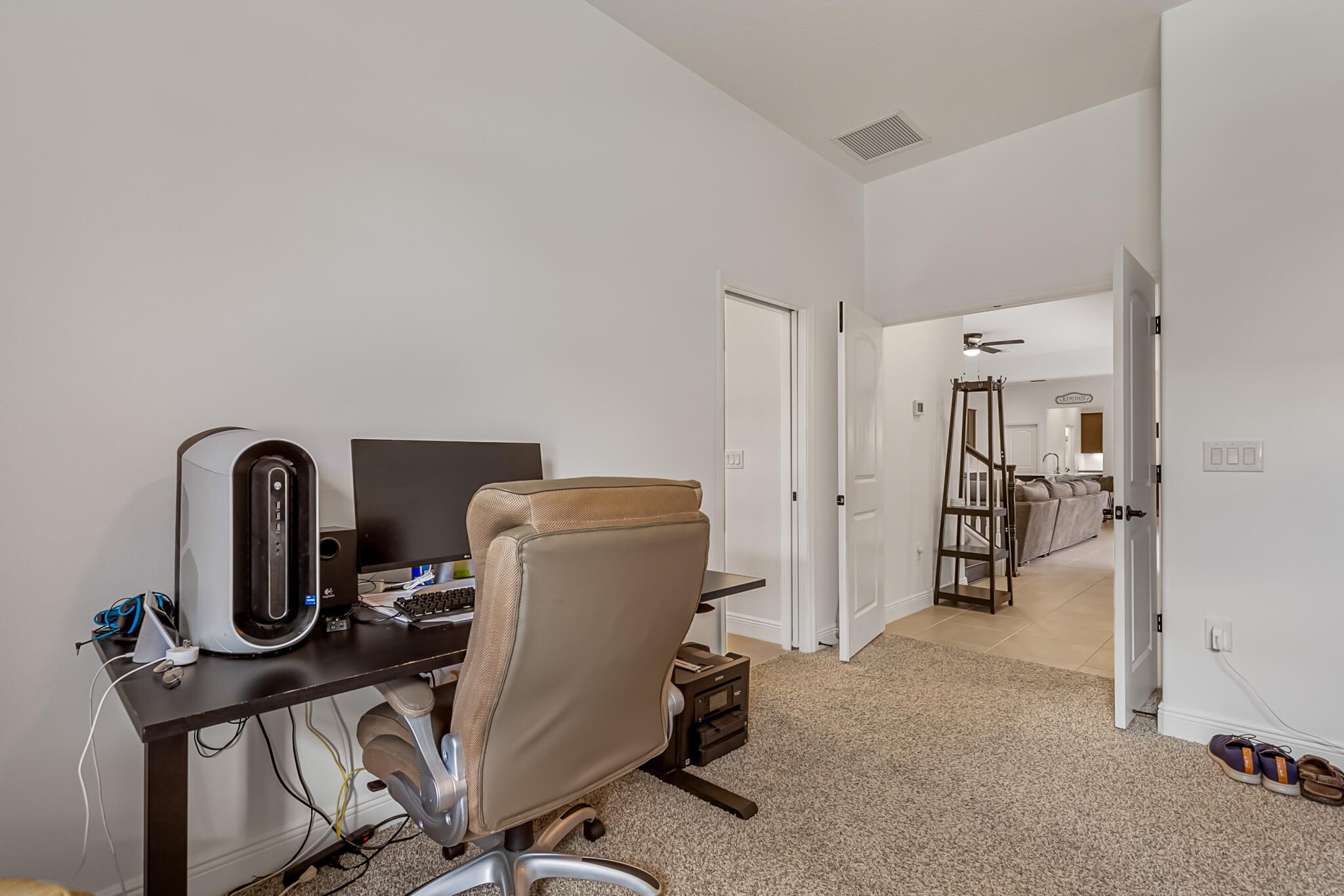 2342 Addison Drive Melbourne, FL 32940 - Photo 14 of 69 a view of a workspace with furniture and gym equipment