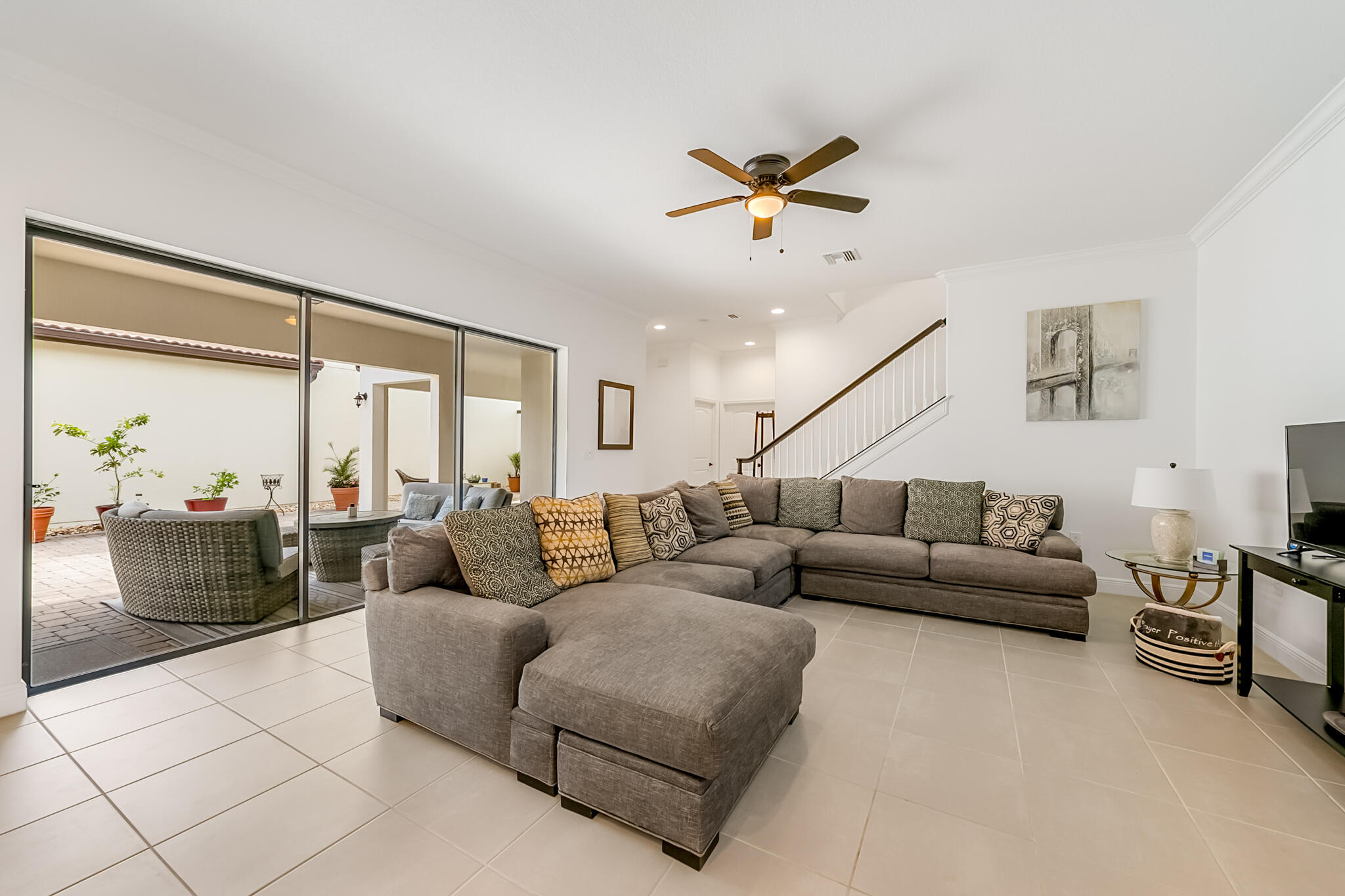 2342 Addison Drive Melbourne, FL 32940 - Photo 19 of 69 a living room with furniture and a large window