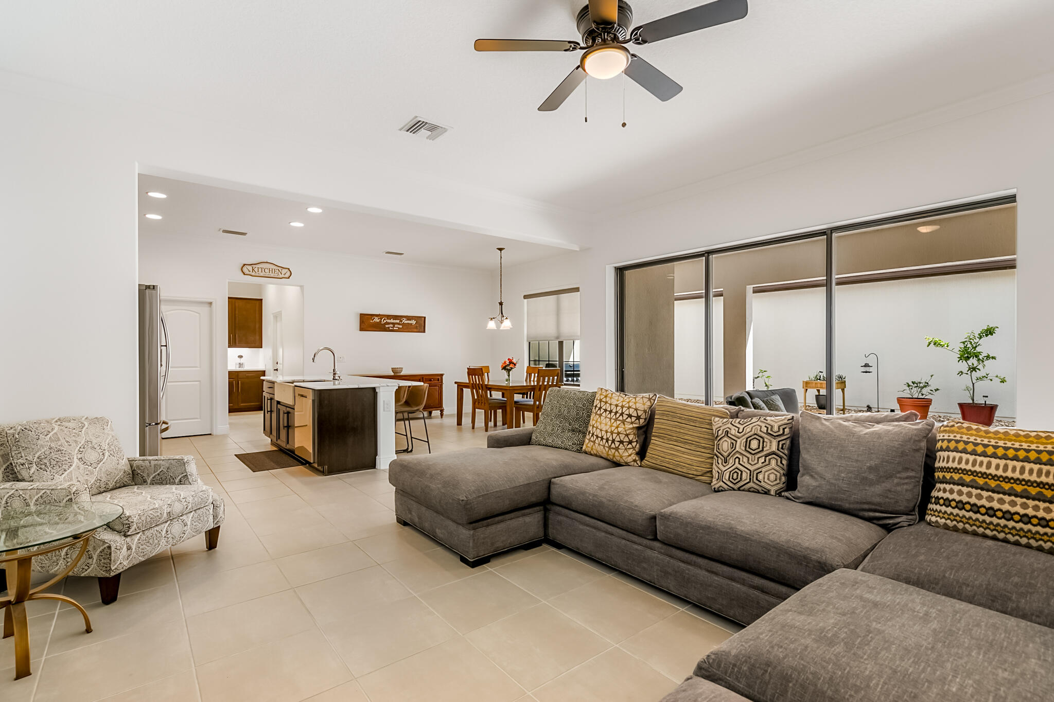 2342 Addison Drive Melbourne, FL 32940 - Photo 20 of 69 a living room with furniture kitchen view and a window