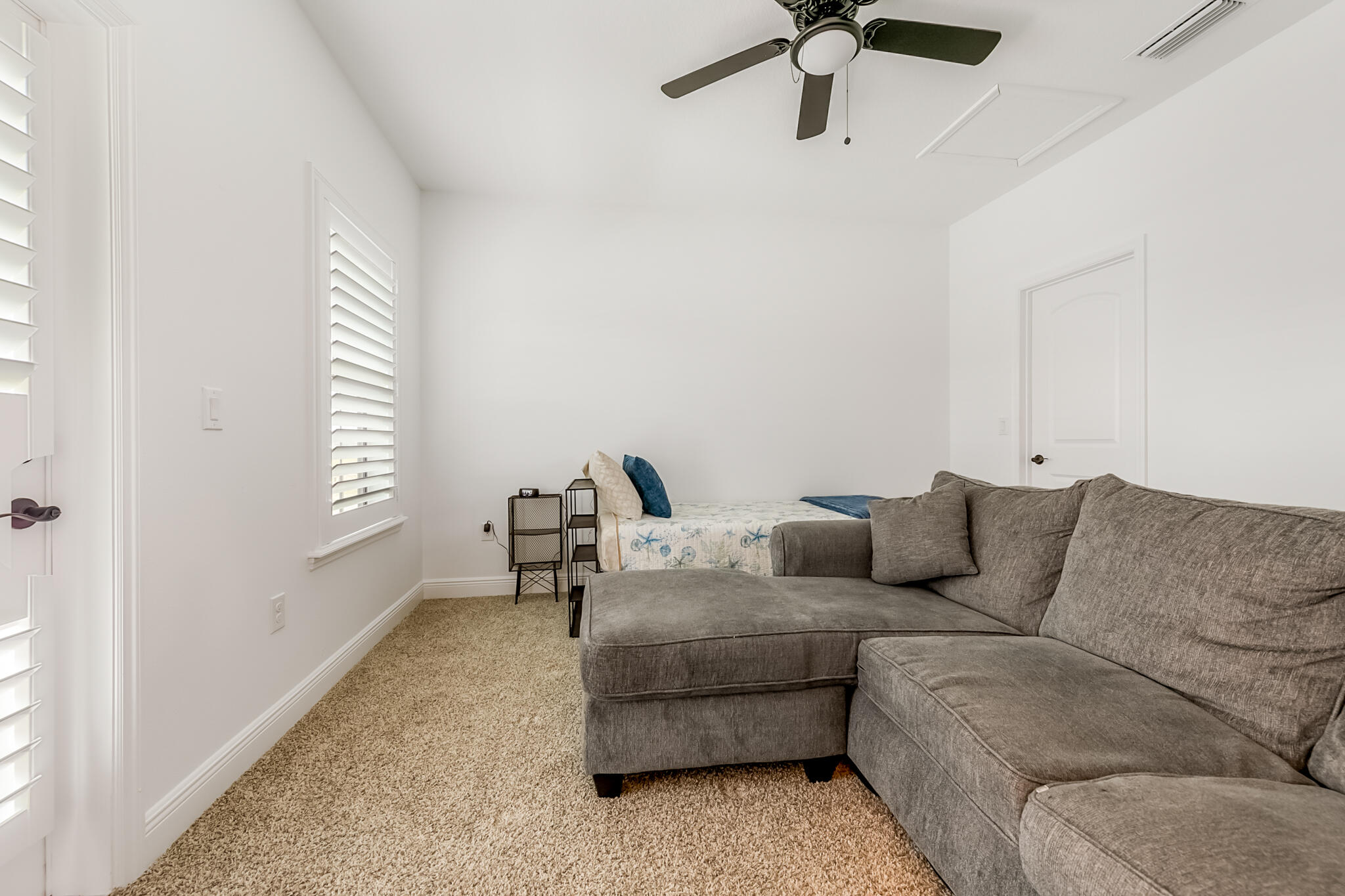 2342 Addison Drive Melbourne, FL 32940 - Photo 23 of 69 a living room with furniture and a window