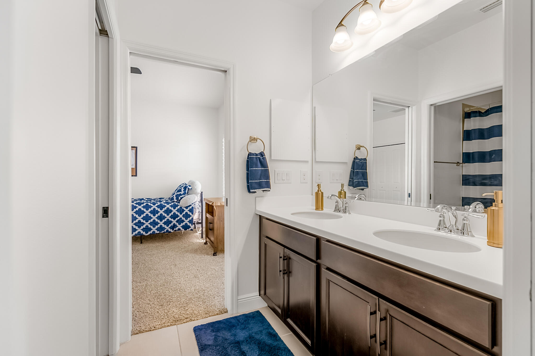 2342 Addison Drive Melbourne, FL 32940 - Photo 24 of 69 a bathroom with a sink a vanity and a mirror