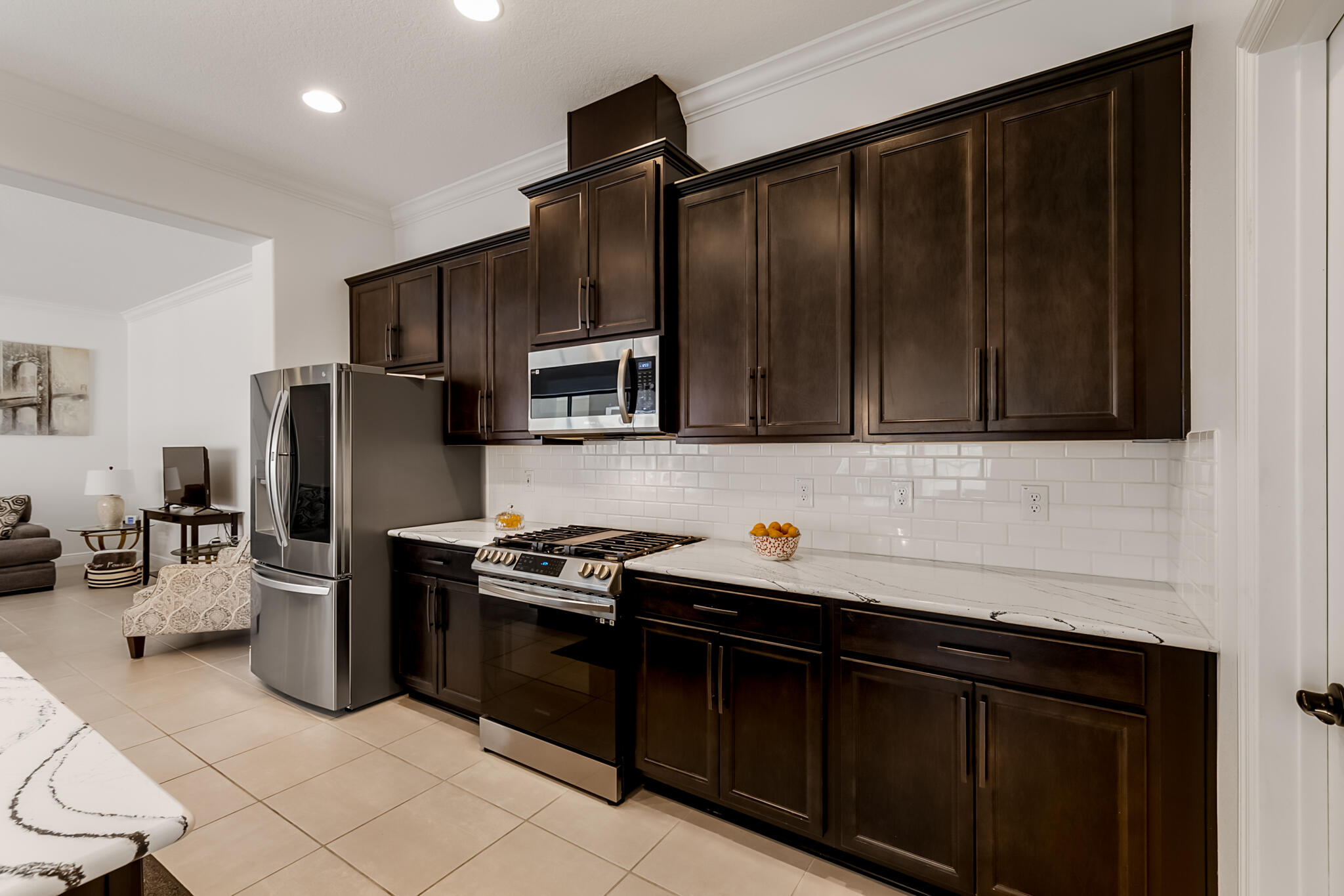 2342 Addison Drive Melbourne, FL 32940 - Photo 42 of 69 a kitchen with a sink stove and refrigerator