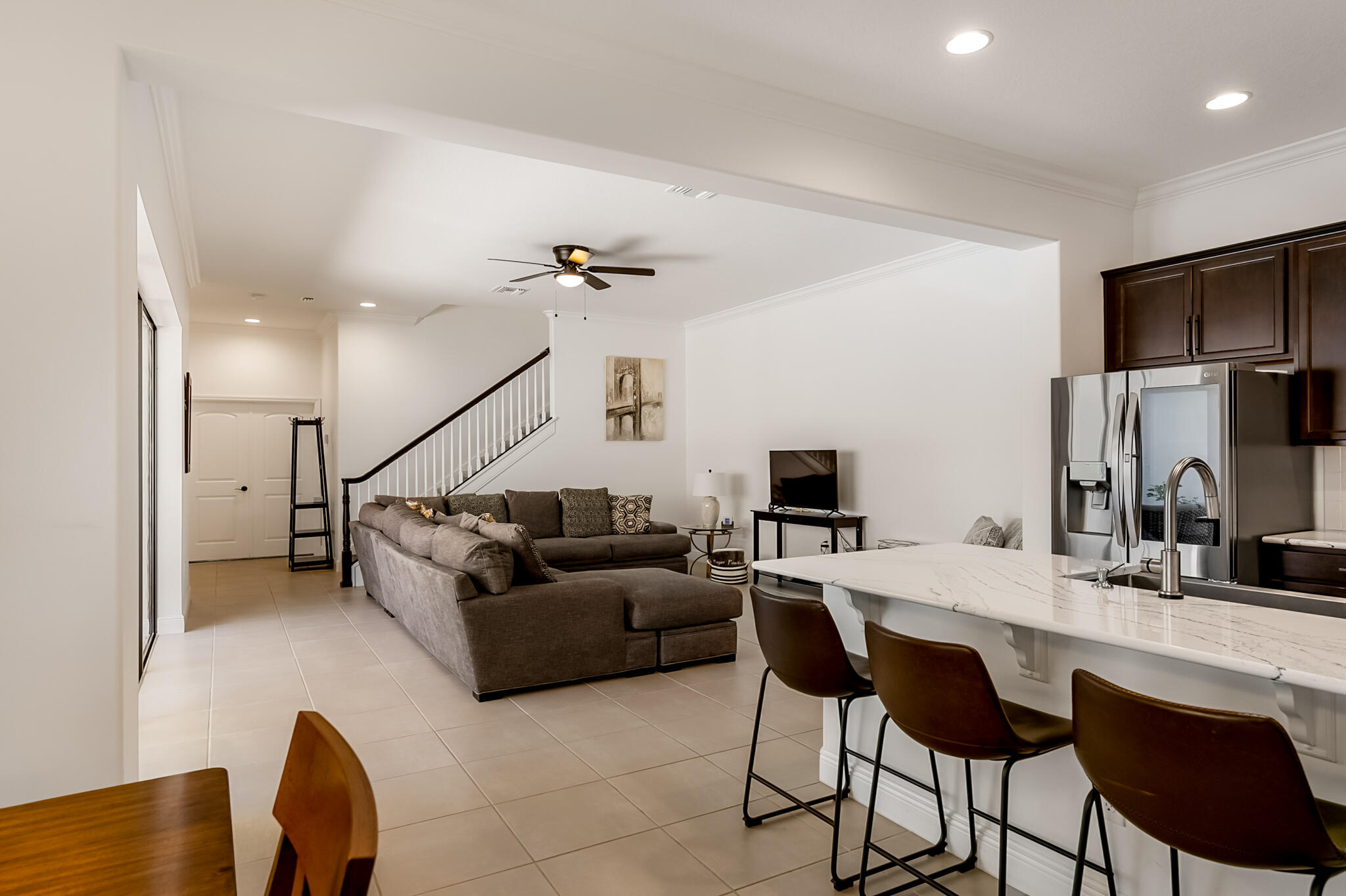 2342 Addison Drive Melbourne, FL 32940 - Photo 46 of 69 a living room with furniture and a flat screen tv