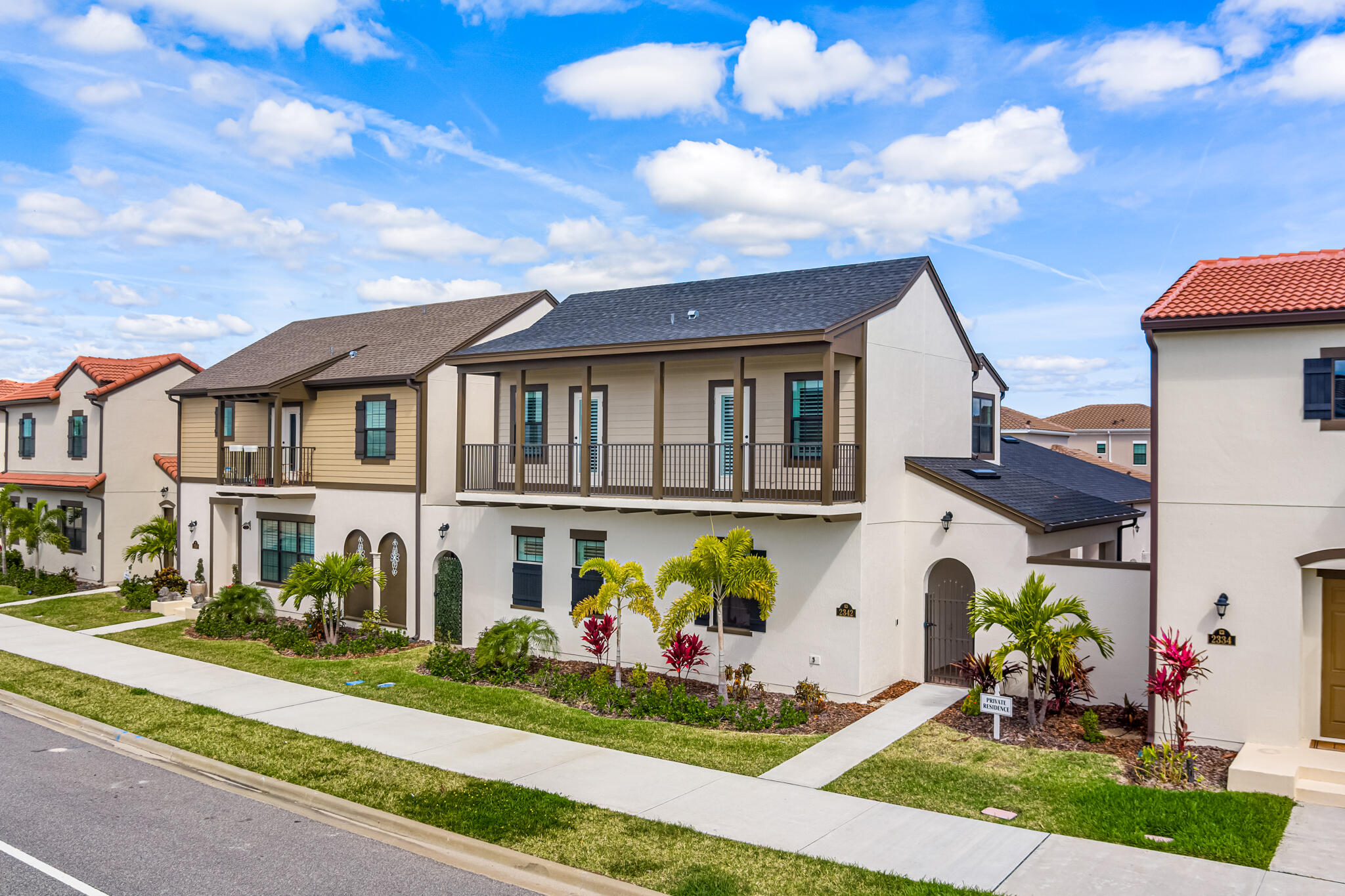 2342 Addison Drive Melbourne, FL 32940 - Photo 55 of 69 a front view of a house with a garden and plants