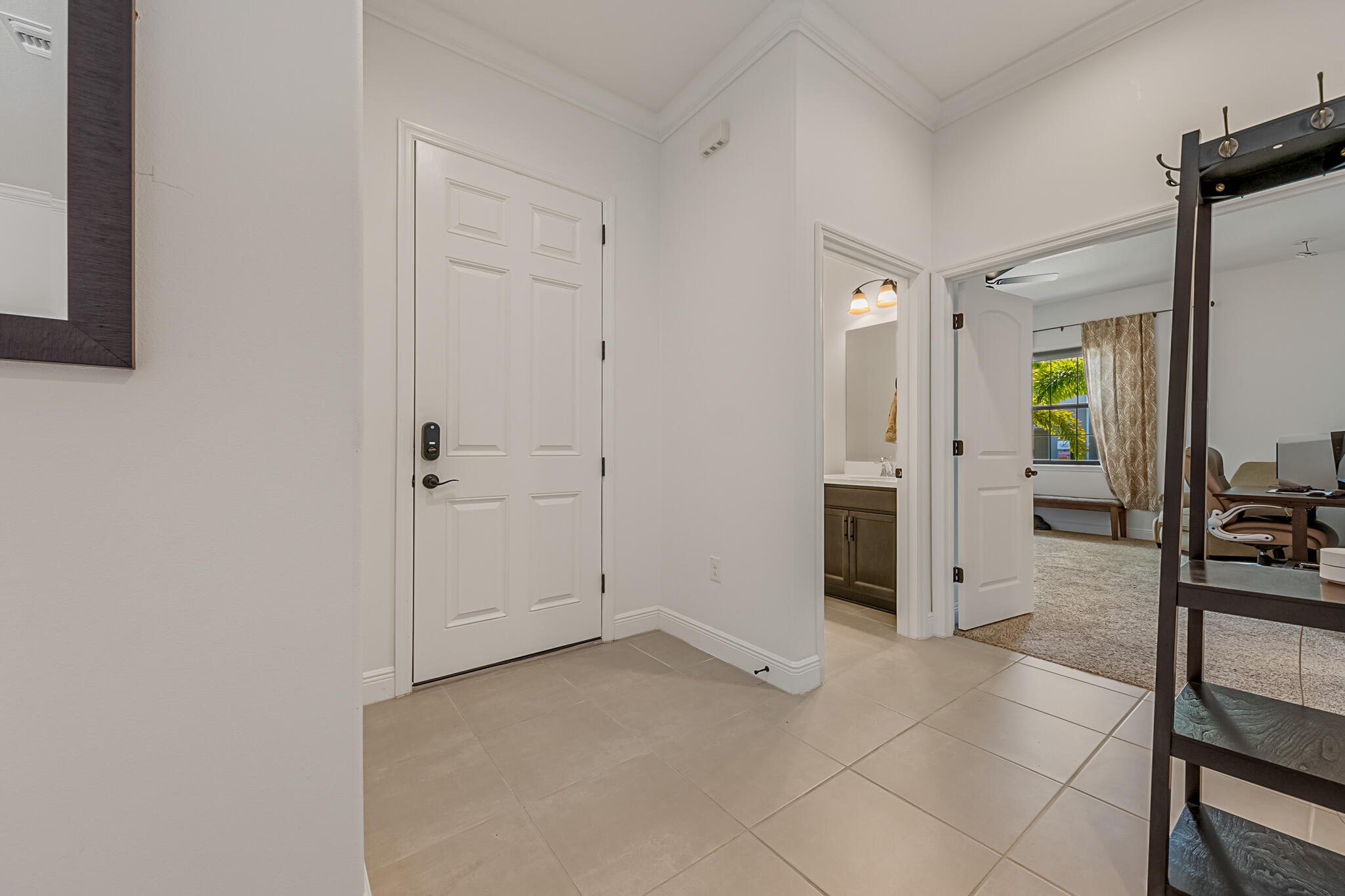 2342 Addison Drive Melbourne, FL 32940 - Photo 7 of 69 a view of a hallway with some storage and utility room