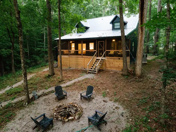 a view of a wooden deck and a yard