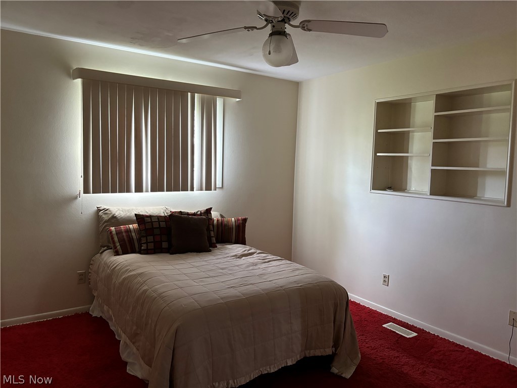 5595 Meister Road Mentor, OH 44060 - Photo 15 of 26 Bedroom 2 with carpet and ceiling fan