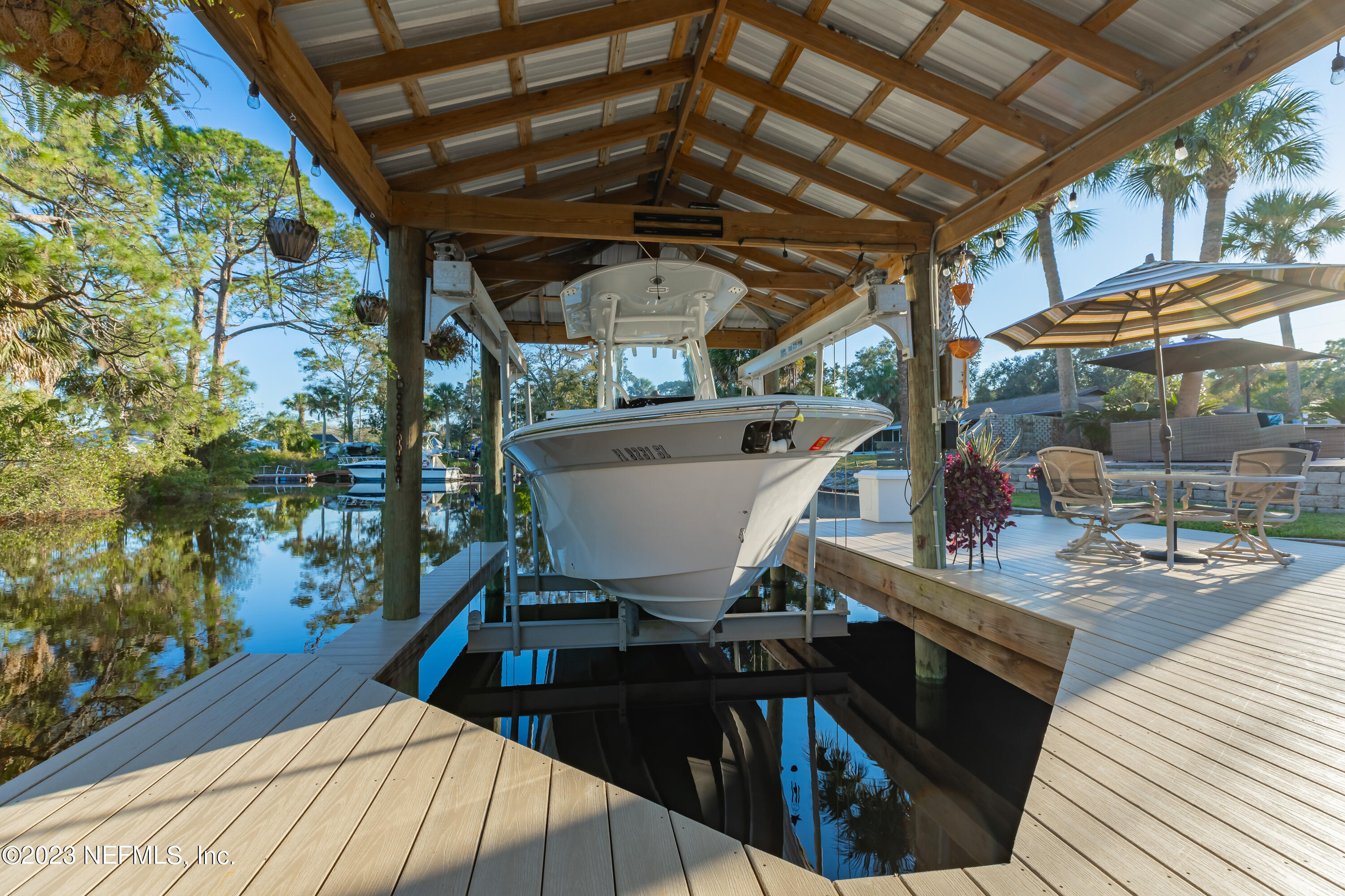 3467 Eunice Road Jacksonville, FL 32250 - Photo 13 of 83 a view of a roof deck with couches and wooden floor