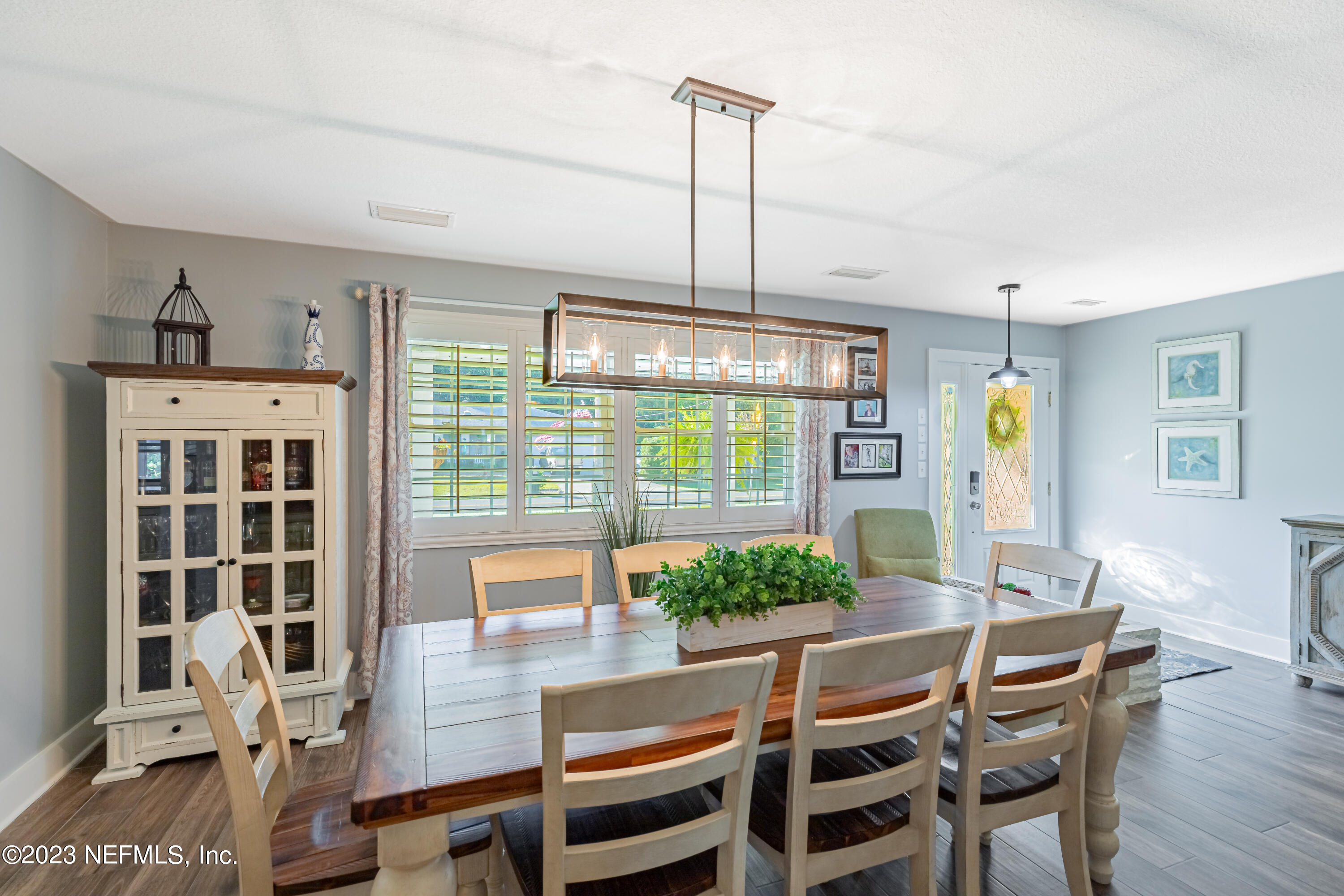 3467 Eunice Road Jacksonville, FL 32250 - Photo 17 of 83 a view of a dining room with furniture window and outside view