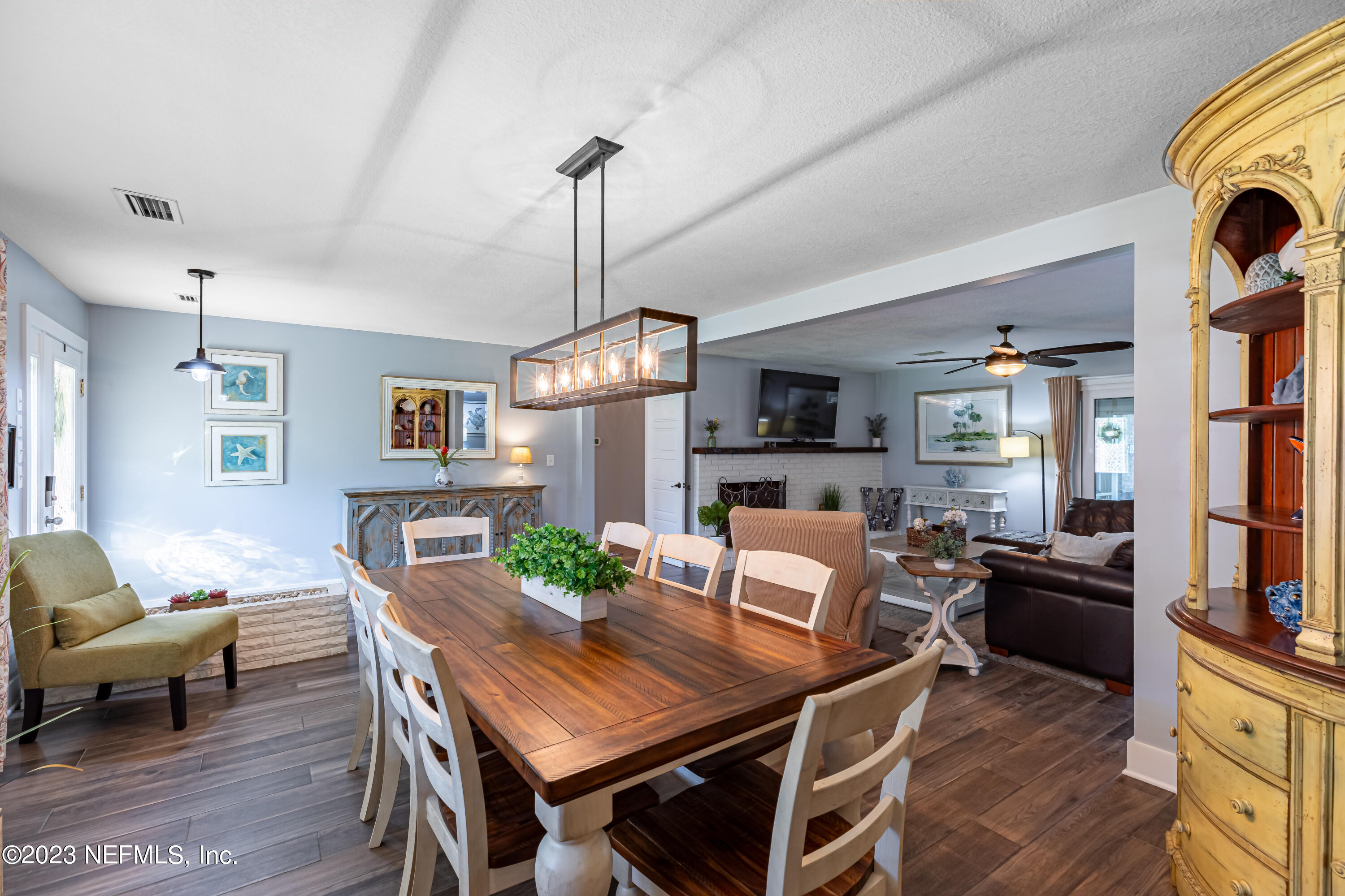 3467 Eunice Road Jacksonville, FL 32250 - Photo 20 of 83 a view of a dining room with furniture window and wooden floor