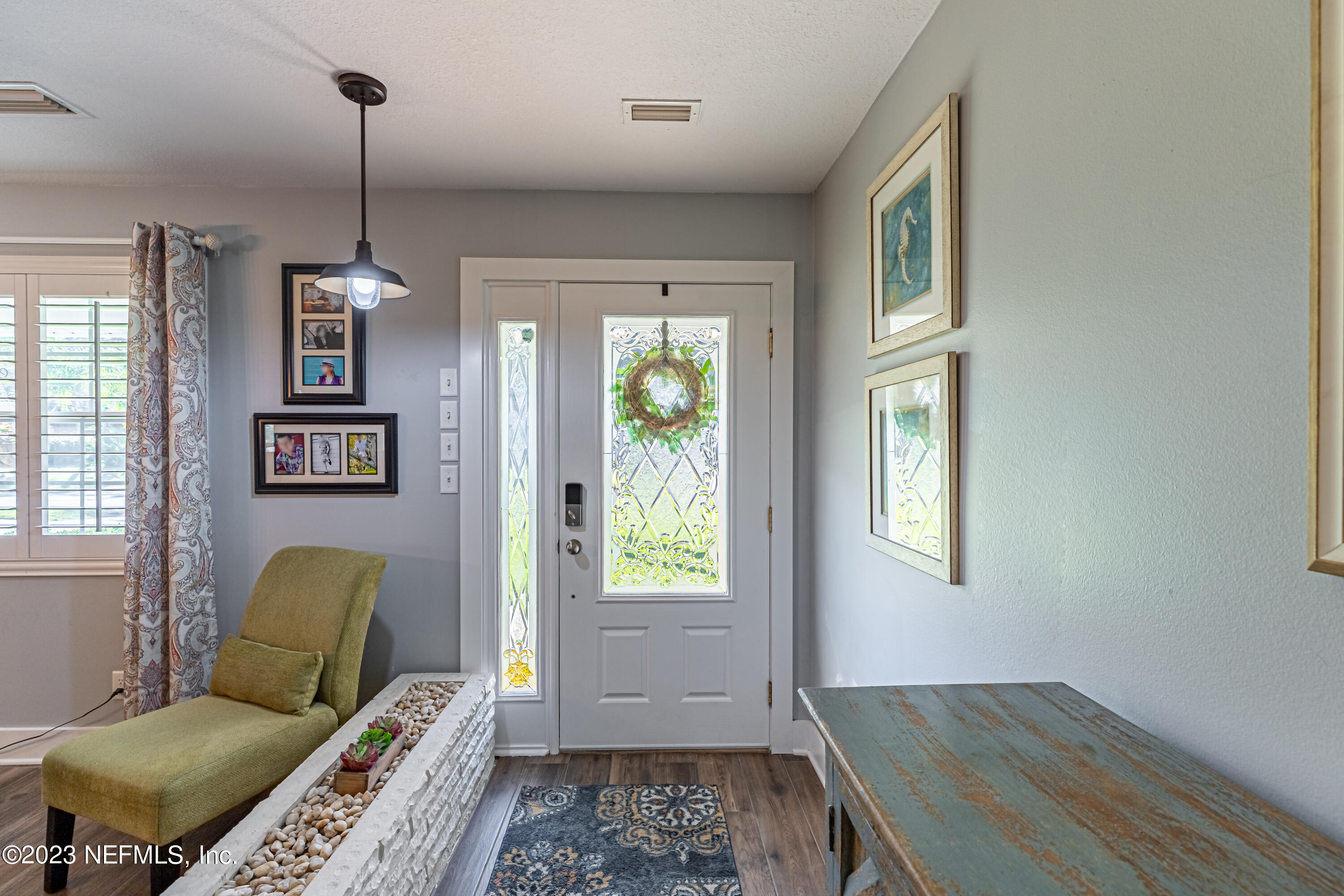 3467 Eunice Road Jacksonville, FL 32250 - Photo 27 of 83 a bedroom with furniture and a window