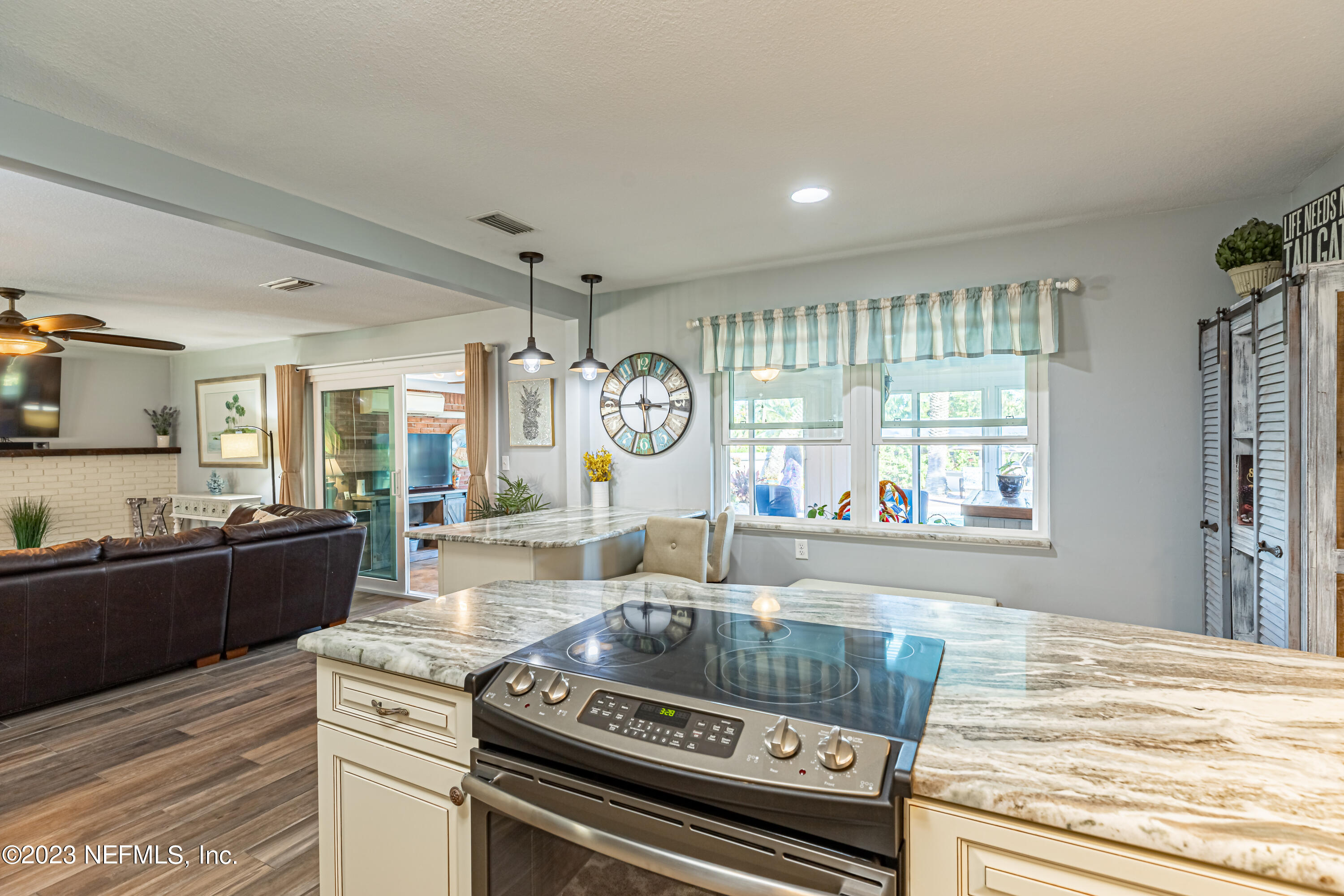3467 Eunice Road Jacksonville, FL 32250 - Photo 29 of 83 a kitchen with stove and cabinets