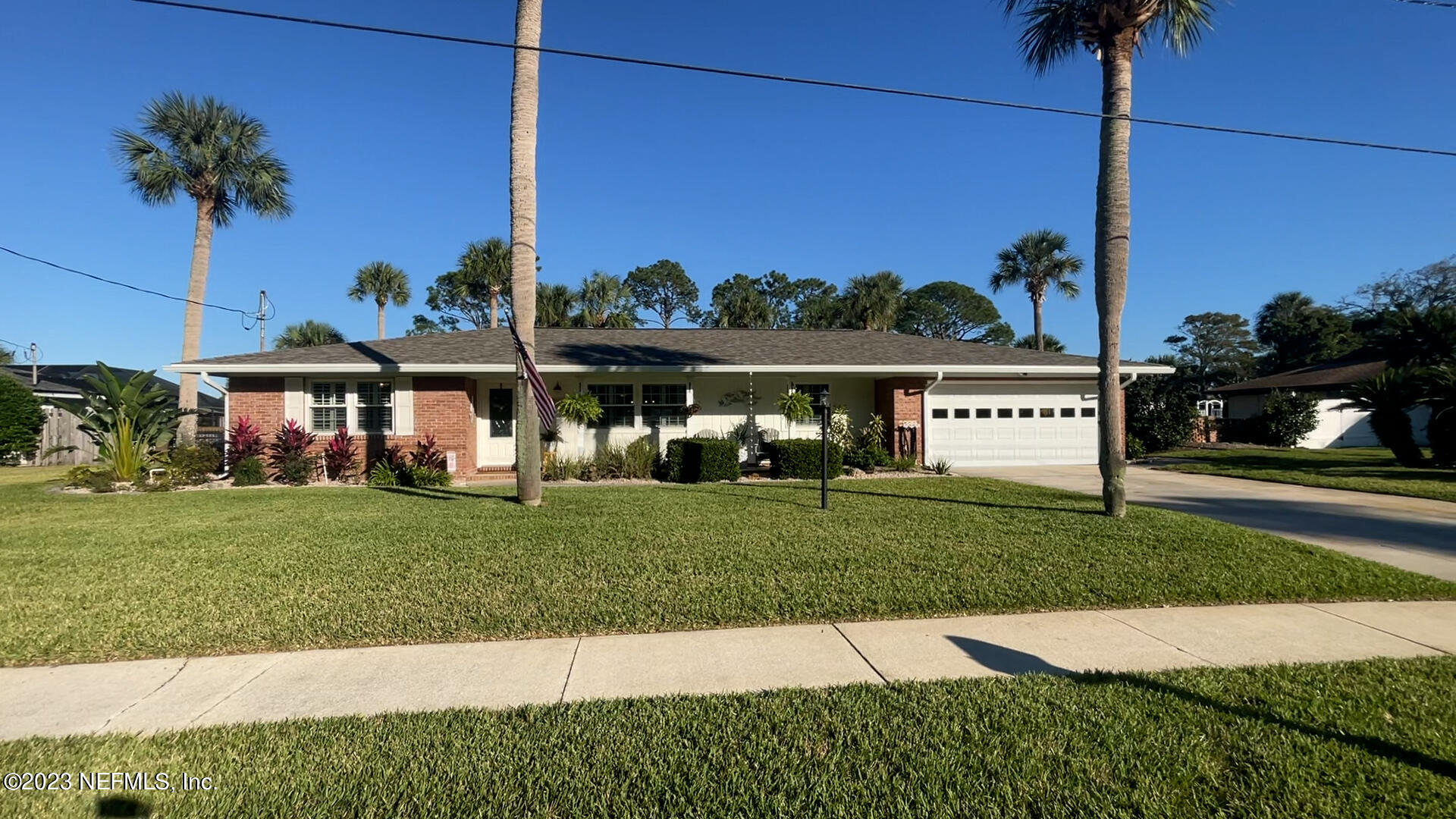 3467 Eunice Road Jacksonville, FL 32250 - Photo 3 of 83 a view of a house with a yard