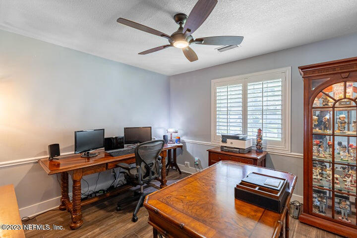 3467 Eunice Road Jacksonville, FL 32250 - Photo 41 of 83 a view of a workspace with furniture and a window