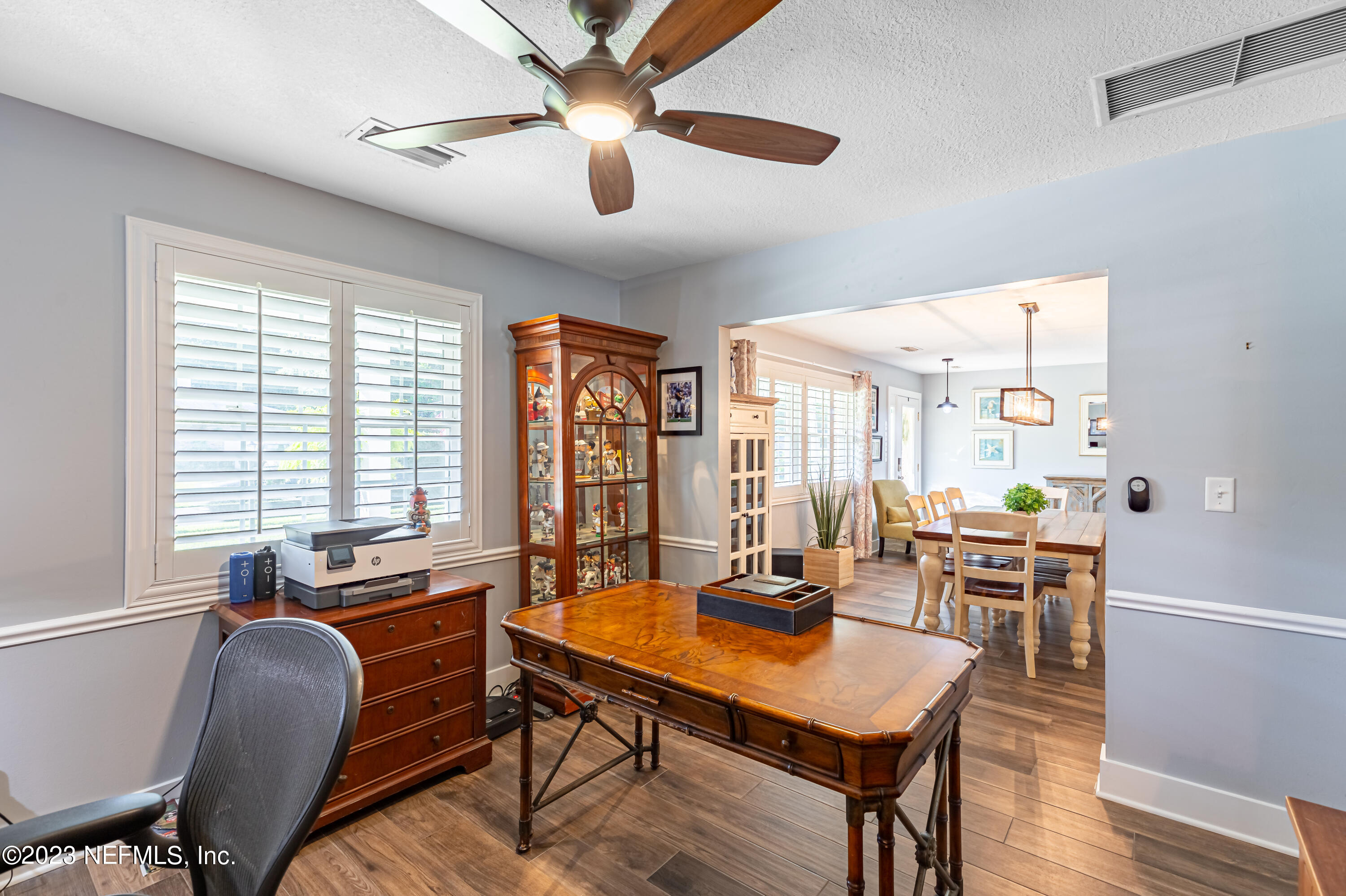3467 Eunice Road Jacksonville, FL 32250 - Photo 44 of 83 a view of a workspace with furniture and a window