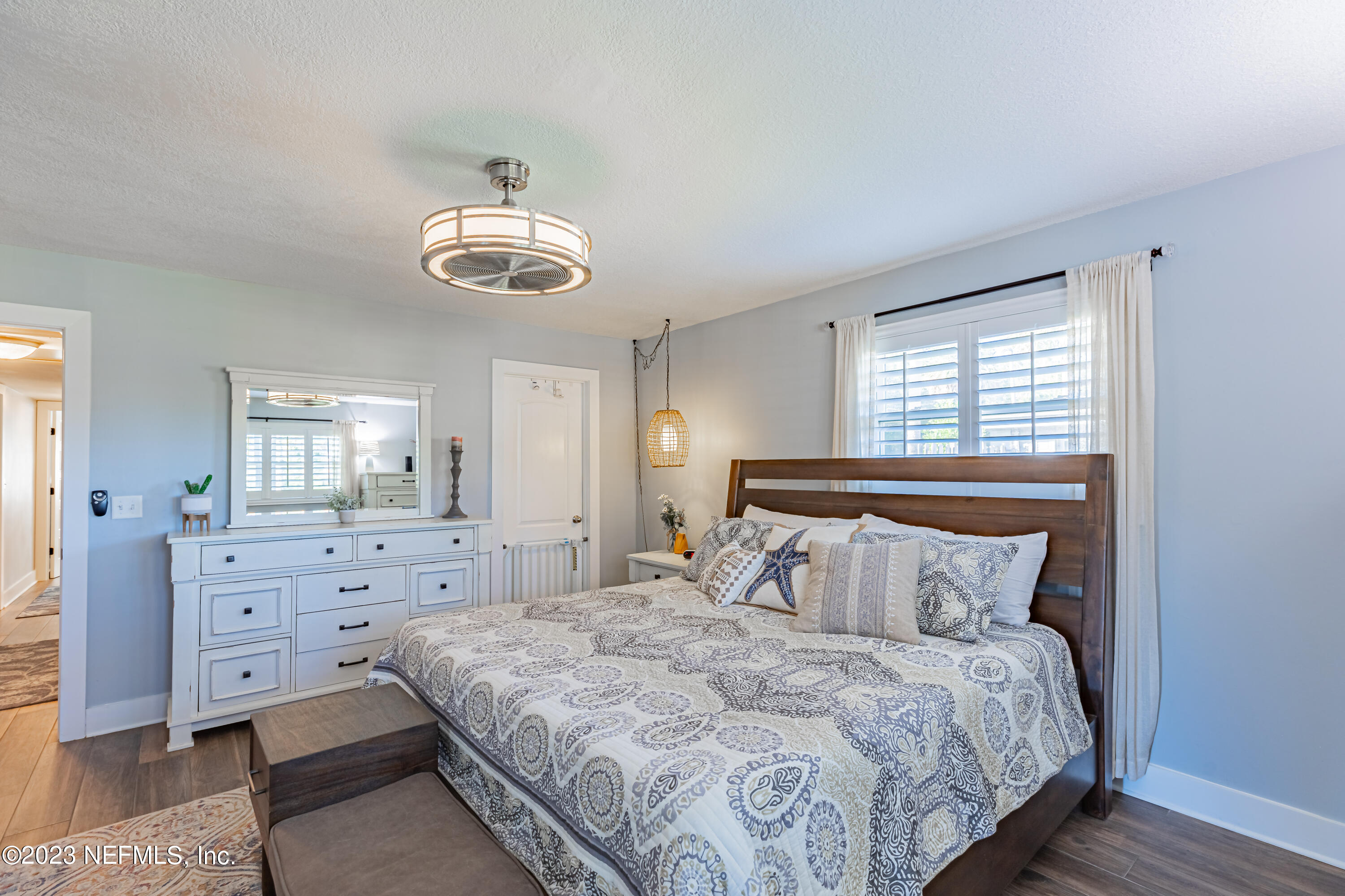 3467 Eunice Road Jacksonville, FL 32250 - Photo 51 of 83 a bedroom with a bed and window