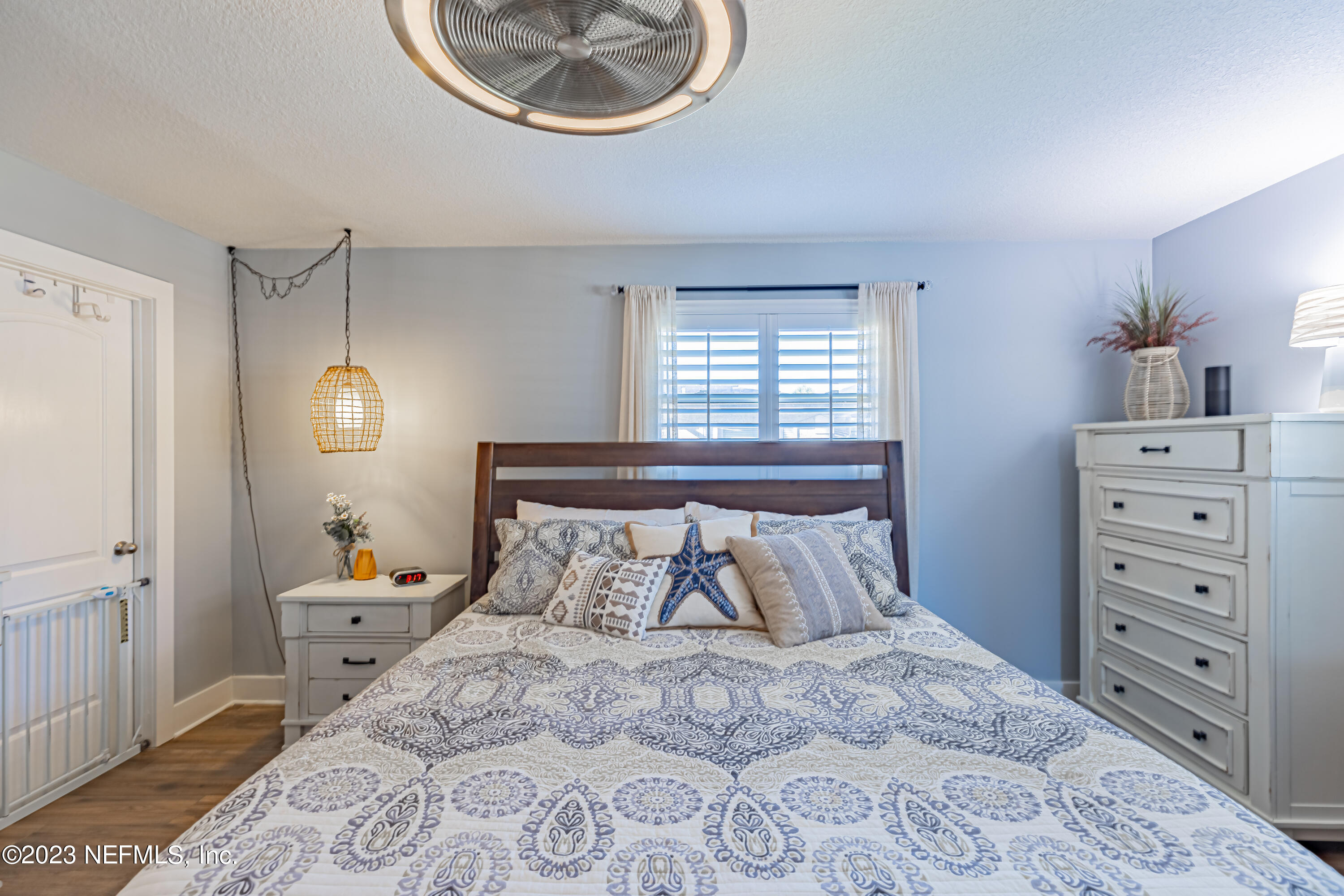 3467 Eunice Road Jacksonville, FL 32250 - Photo 52 of 83 a bedroom with a bed and a window