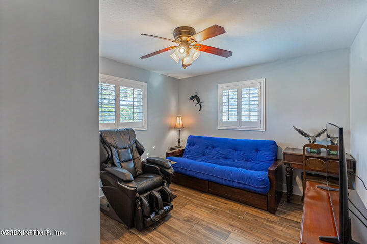 3467 Eunice Road Jacksonville, FL 32250 - Photo 60 of 83 a living room with furniture and a window