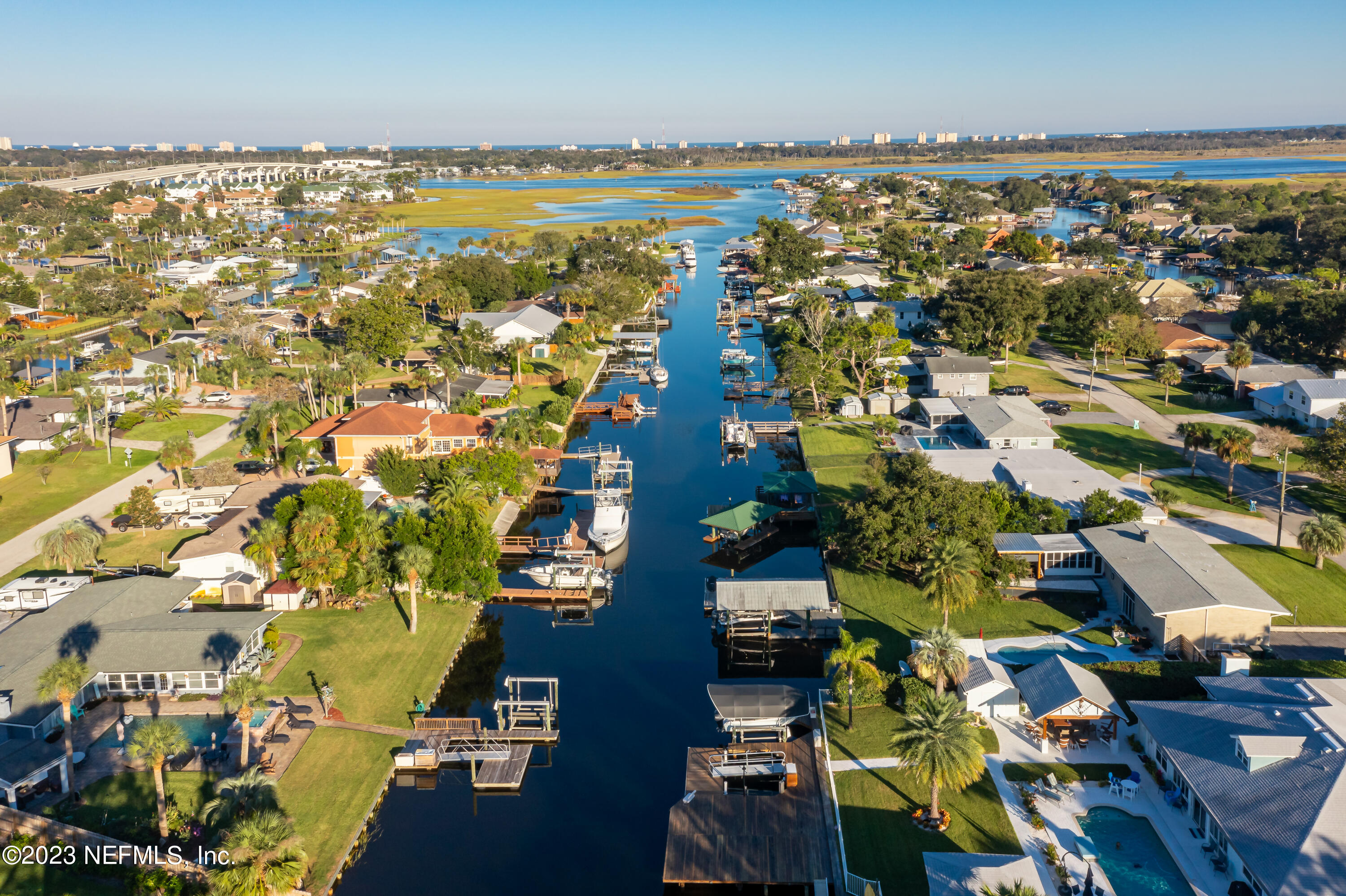 3467 Eunice Road Jacksonville, FL 32250 - Photo 7 of 83 an aerial view of residential building and parking space
